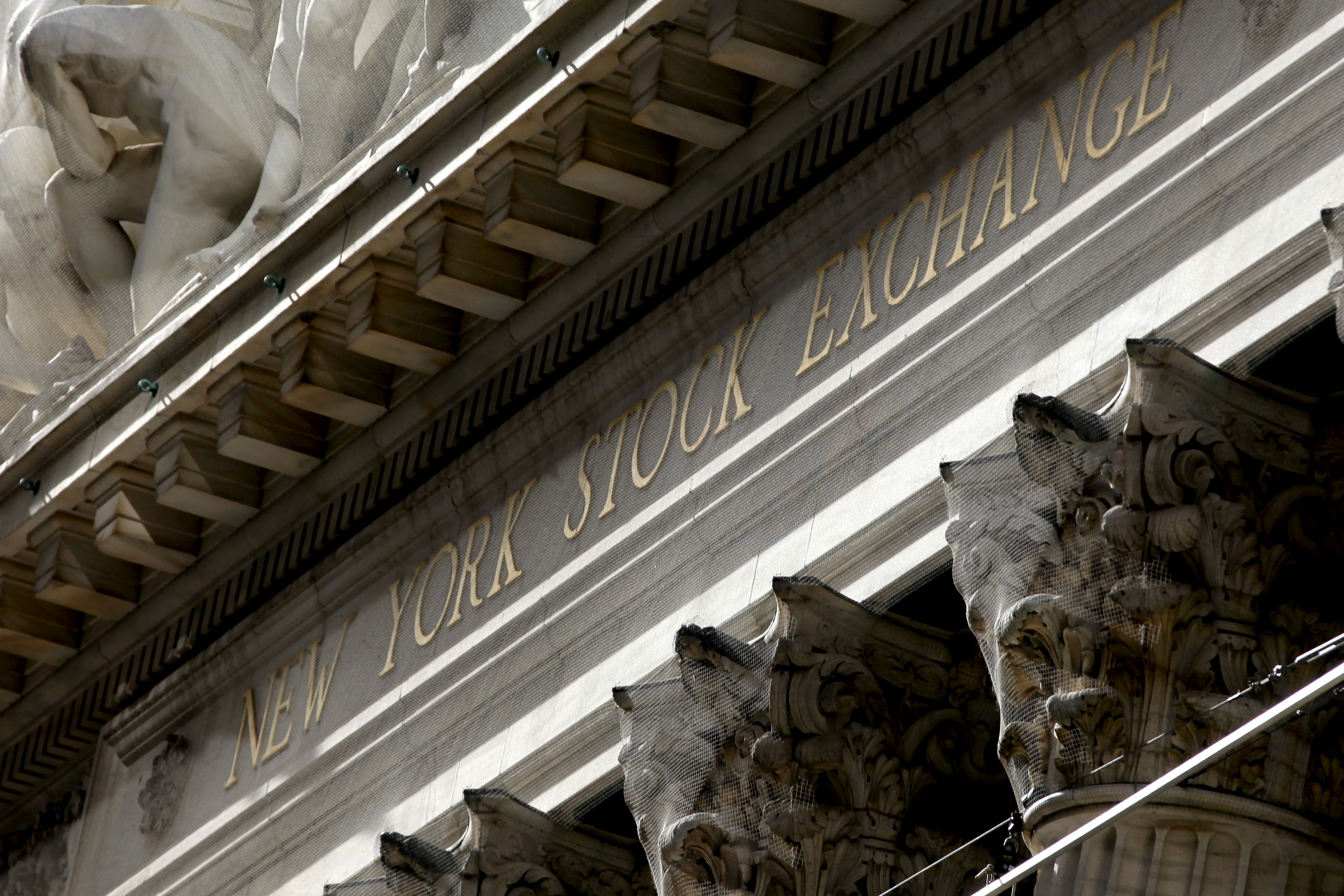 The New York Stock Exchange building is seen from Broad Street in Lower Manhattan in New York, January 20, 2016. 