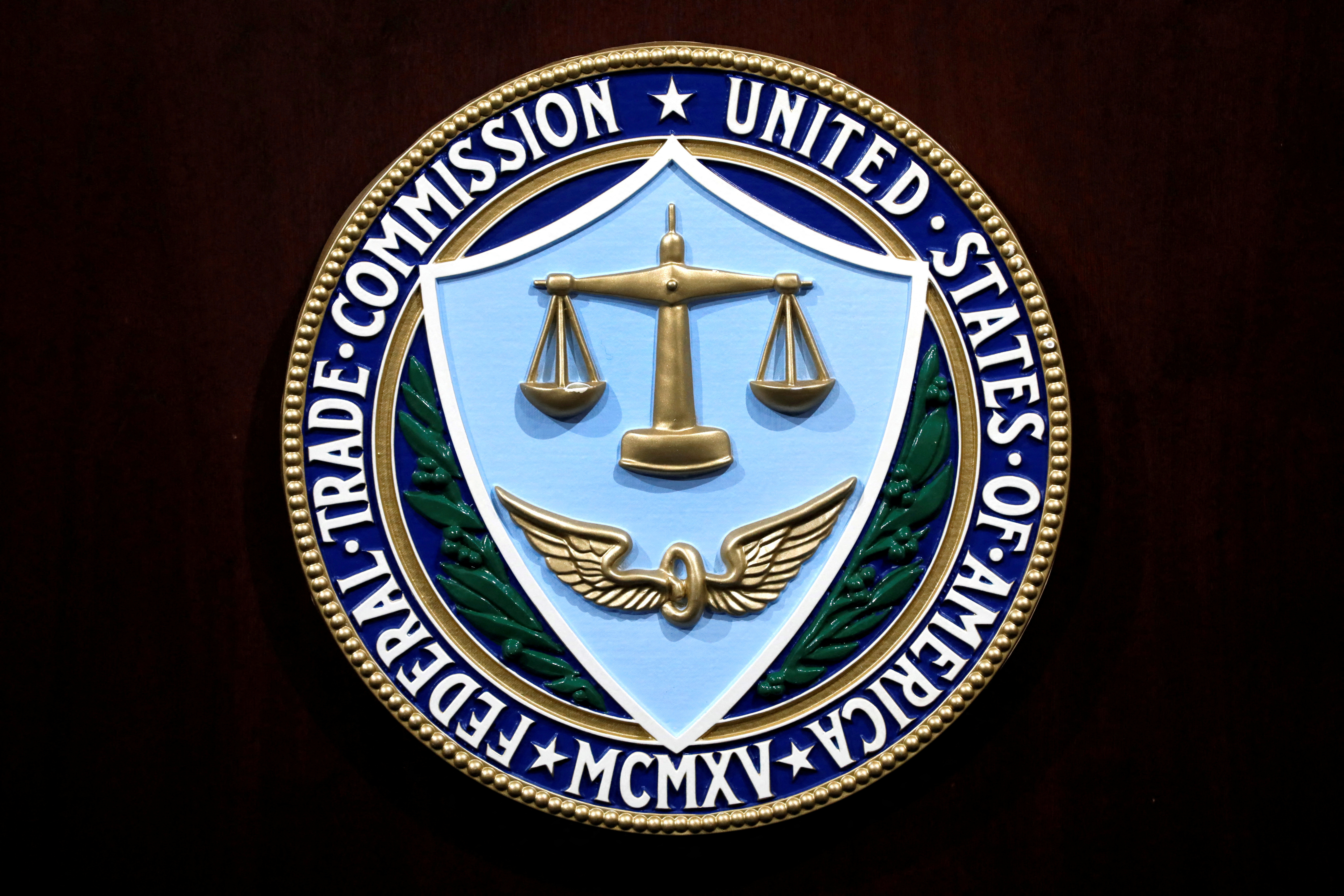 Federal Trade Commission seal is seen at a news conference at FTC headquarters in Washington, U.S., July 24, 2019. 