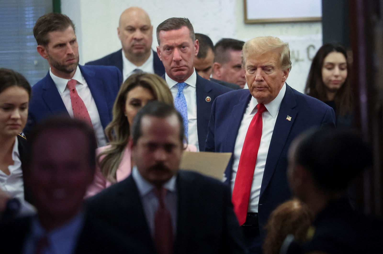 Former U.S. President Donald Trump leaves the courtroom during a break, as he attends the Trump Organization civil fraud trial, in New York State Supreme Court in the Manhattan borough of New York City, U.S., December 7, 2023. 