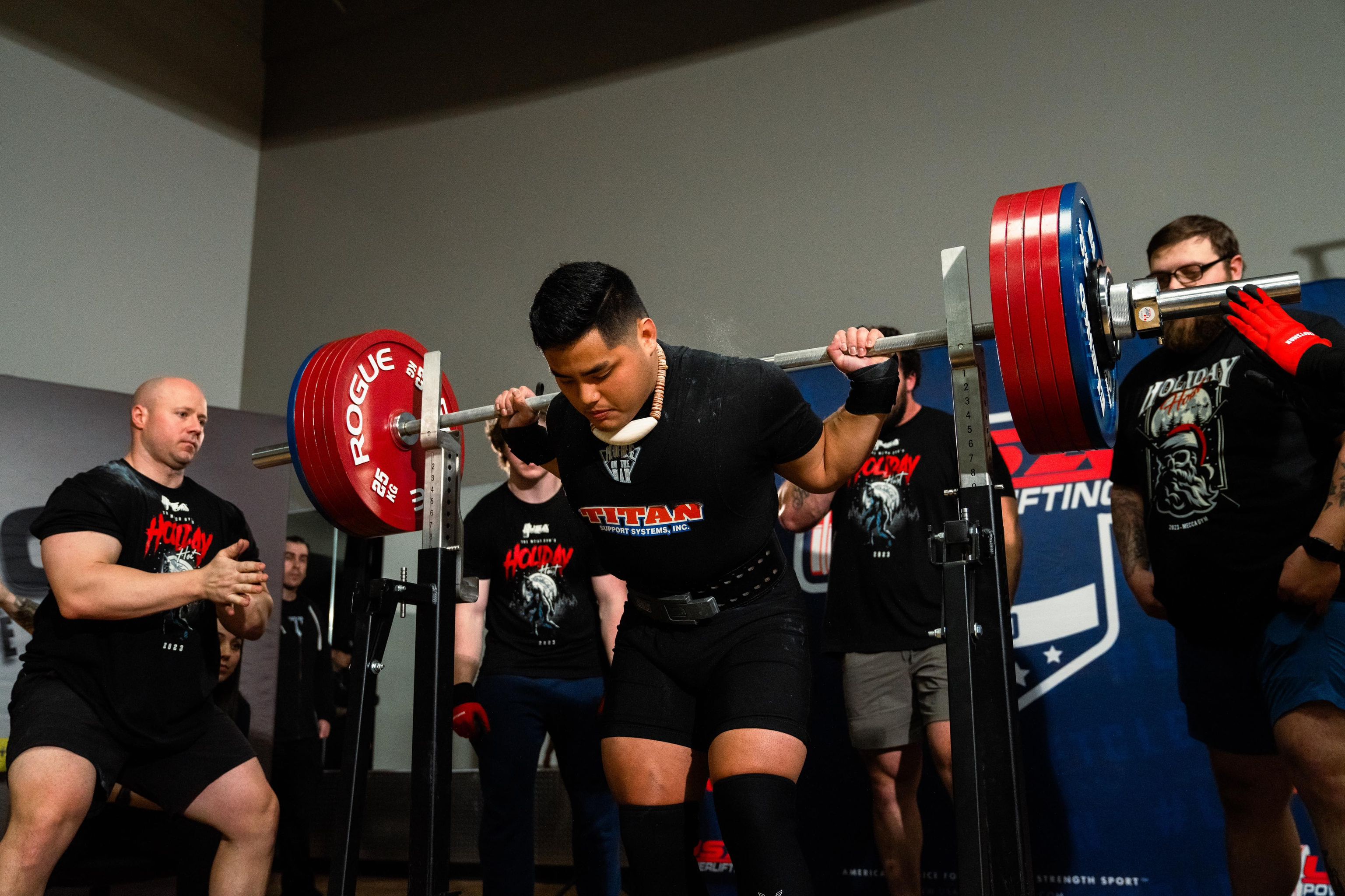 Roman Reyes Jr. prepares for the squat portion of the 2023 USA Powerlifting Holiday Hoist in Meridian, Idaho on Dec. 16. 