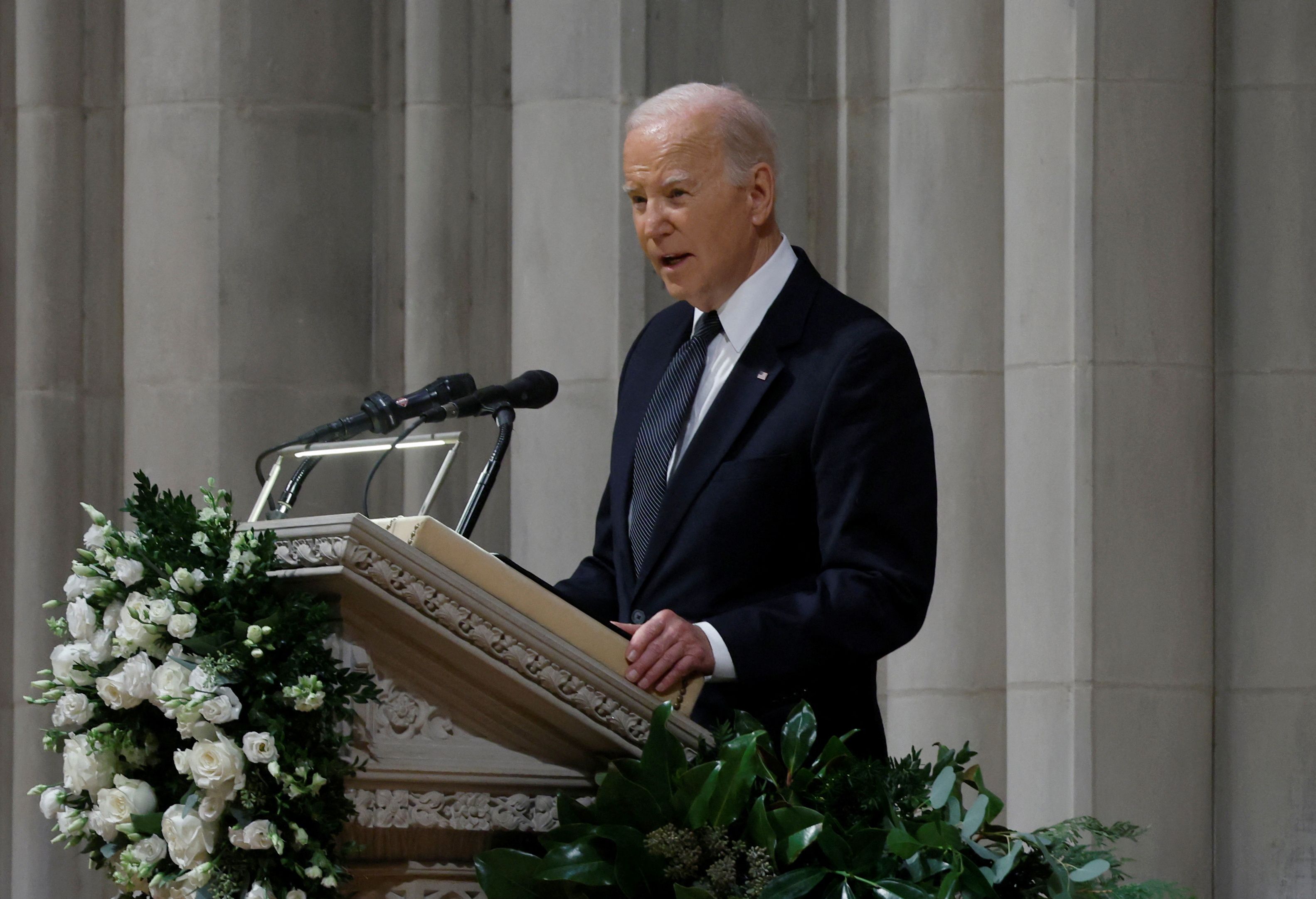U.S. President Joe Biden delivers remarks during the funeral service for retired U.S. Supreme Court Justice Sandra Day O’Connor at the Washington National Cathedral in Washington, U.S., December 19, 2023. 