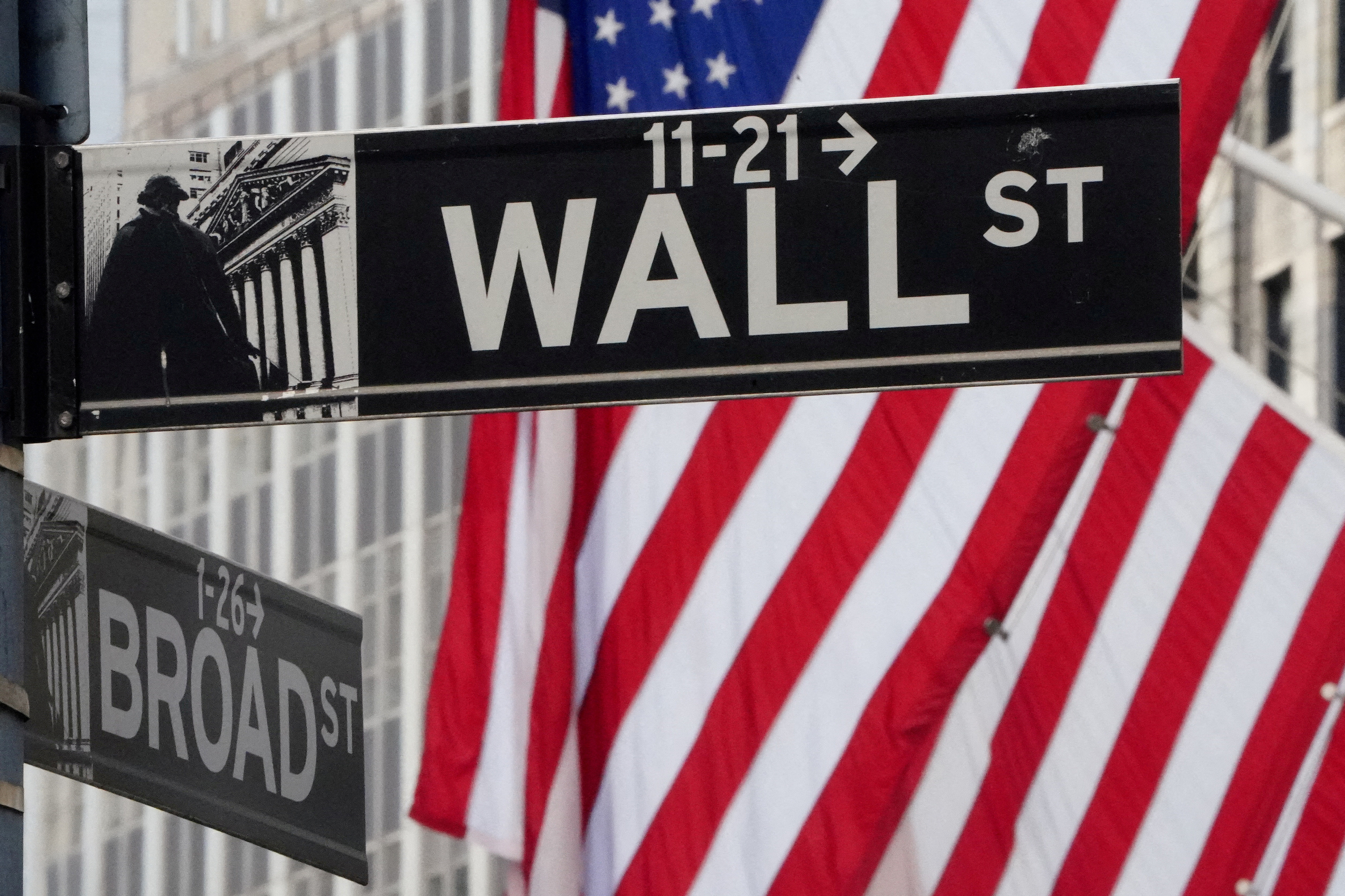The Wall Street sign is pictured at the New York Stock exchange (NYSE) in the Manhattan borough of New York City, New York, U.S., March 9, 2020. 