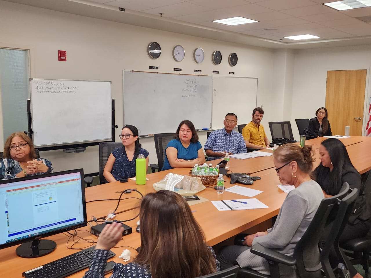 Commonwealth Healthcare Corp. Chief Executive Officer Esther L. Muna, board trustees Phyllis Chong, Polly Masga and Juan N. Babauta, along with CHCC staff, attend a board meeting on Thursday in the CHCC conference room.