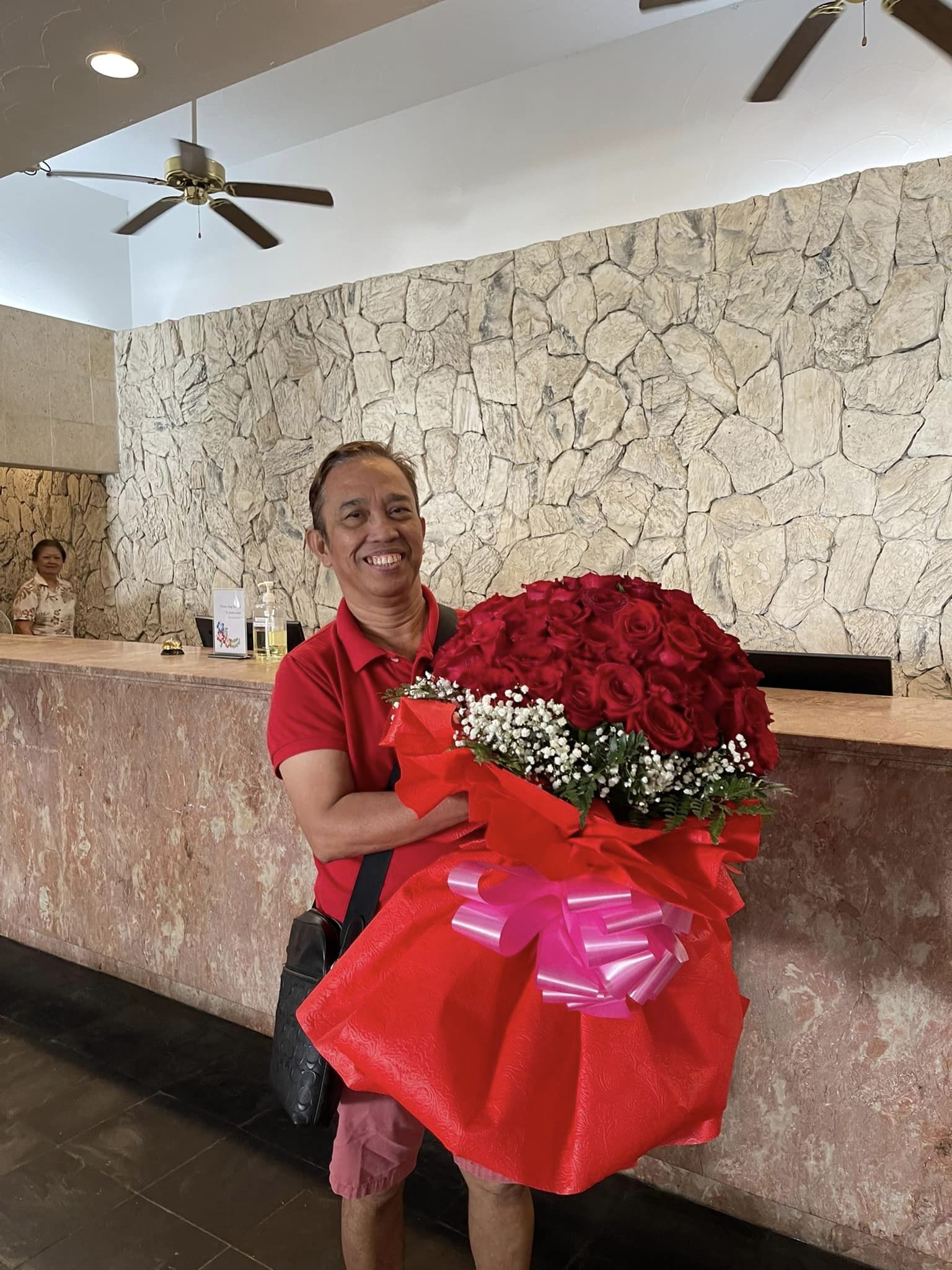 Canuto on his way to deliver a grand bouquet. 