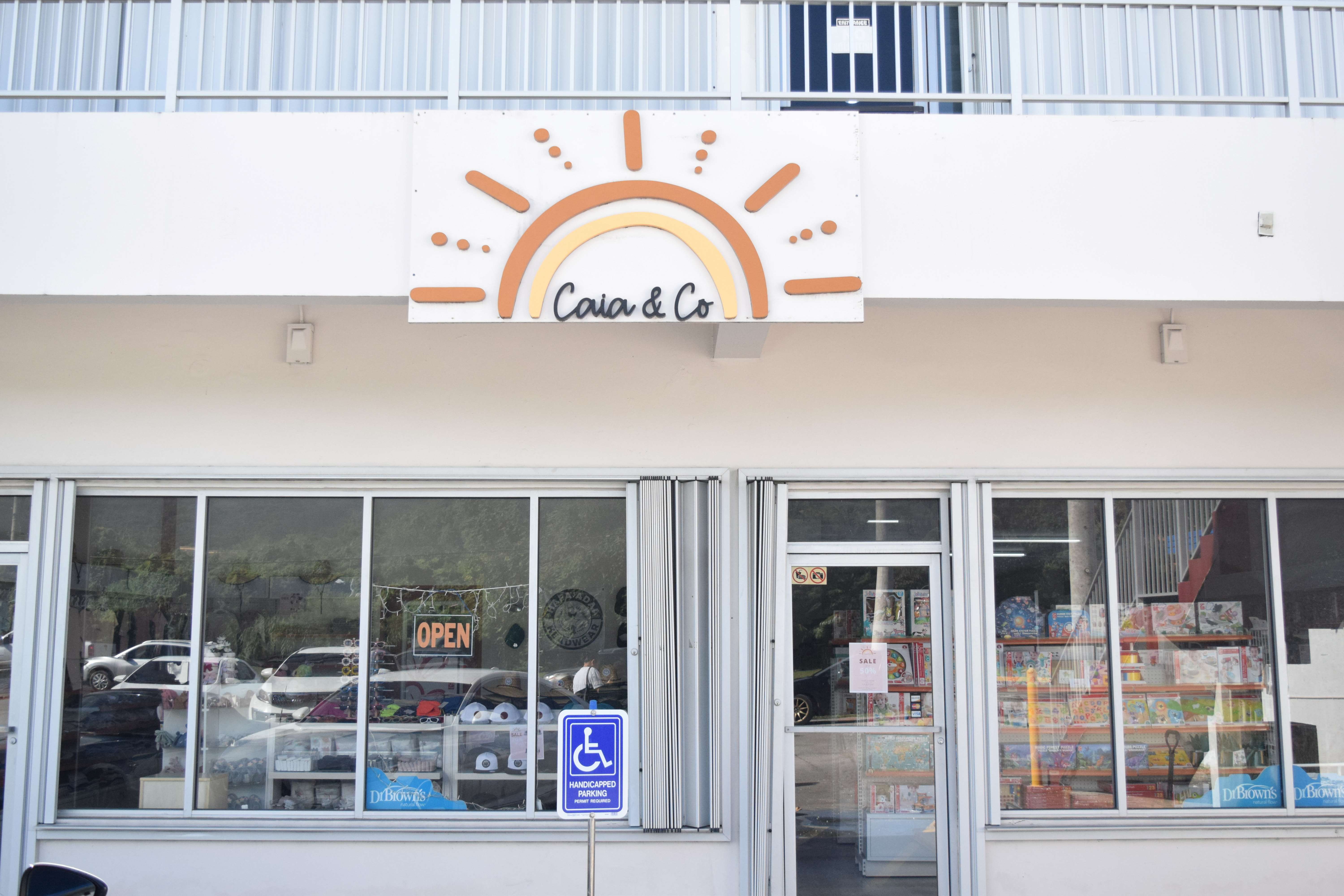 Caia & Co. is on the ground floor of Tun Kiku Building near the intersection of Middle Road and Garapan St.