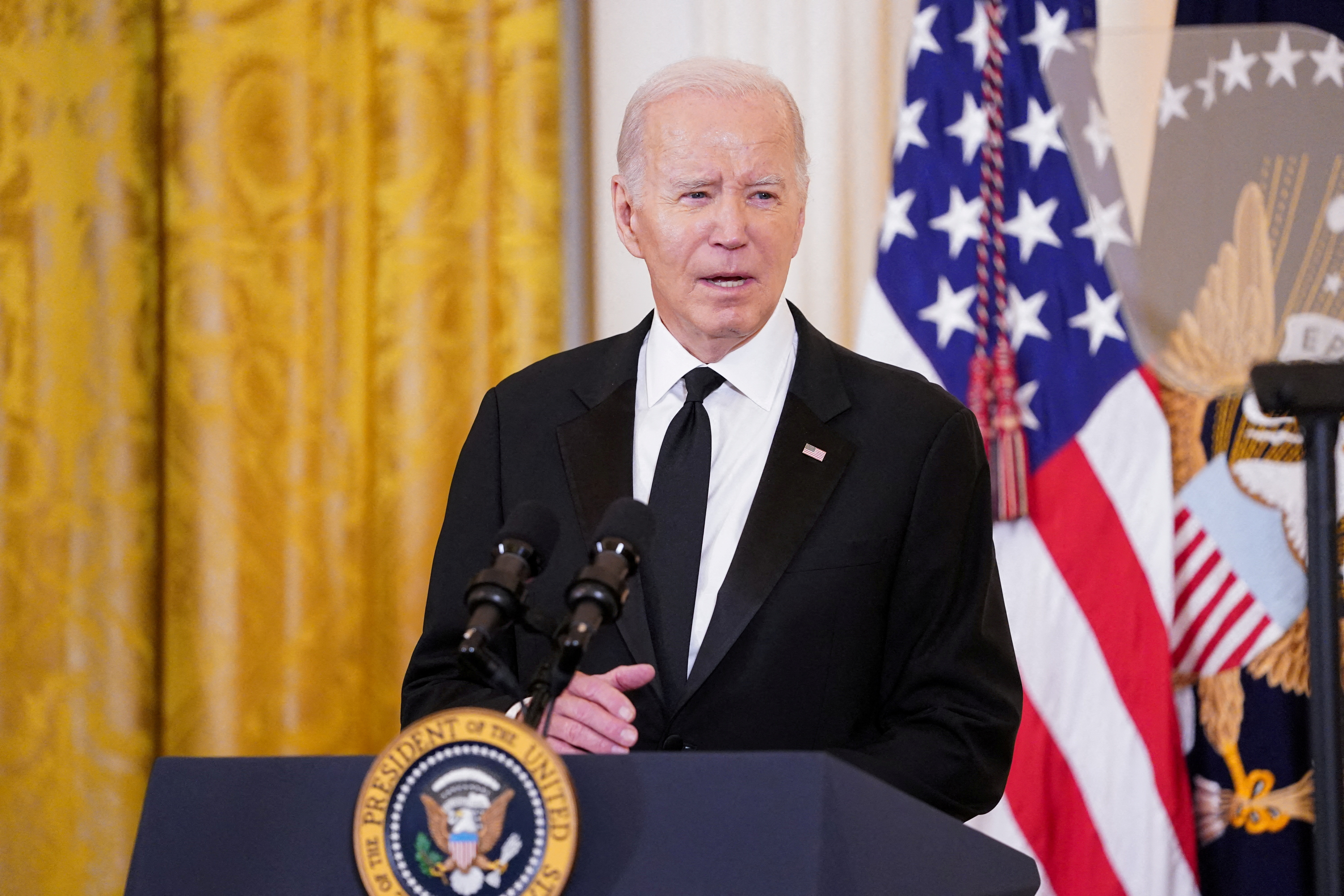 U.S. President Joe Biden speaks during a reception at the White House ahead of the 46th Kennedy Center Honors gala, in Washington, U.S. December 3, 2023. 