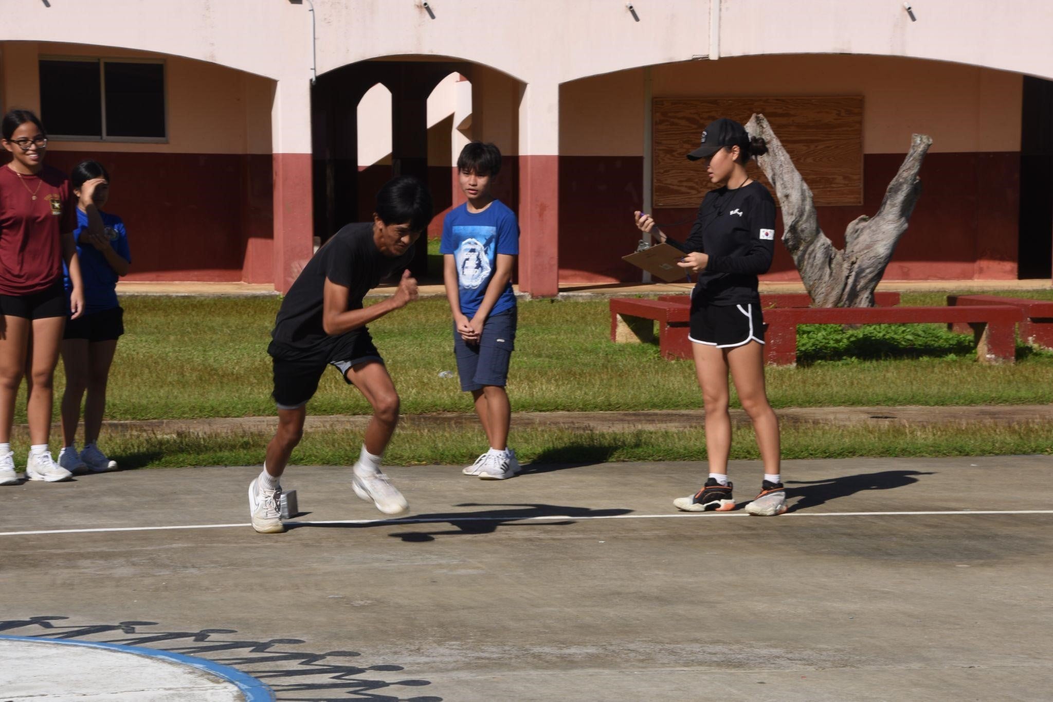 A cadet performs a shuttle-run exercise.