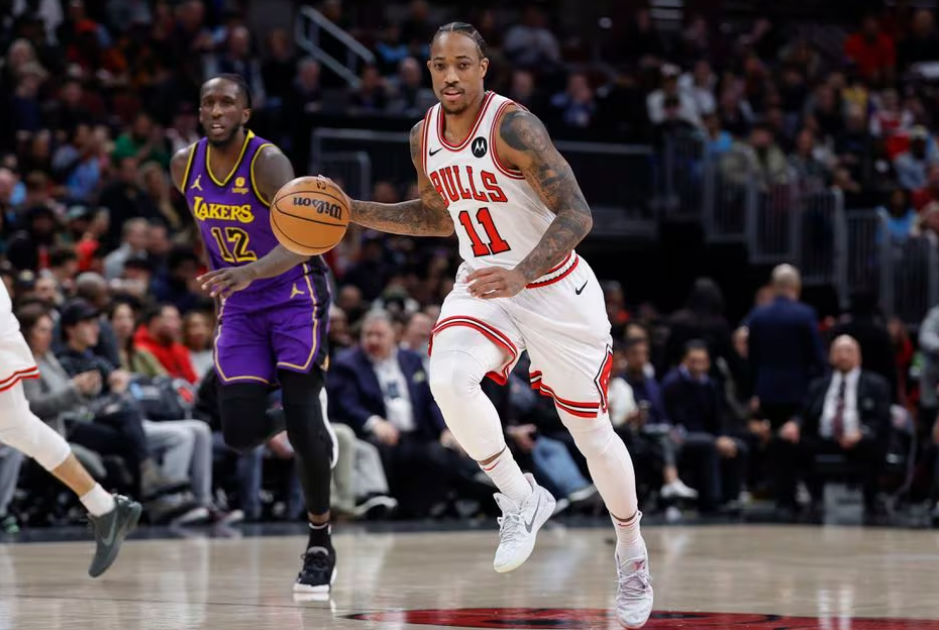 Chicago Bulls forward DeMar DeRozan (11) brings the ball up court against the Los Angeles Lakers during the first half at United Center in Chicago, Illinois, Dec. 20, 2023.