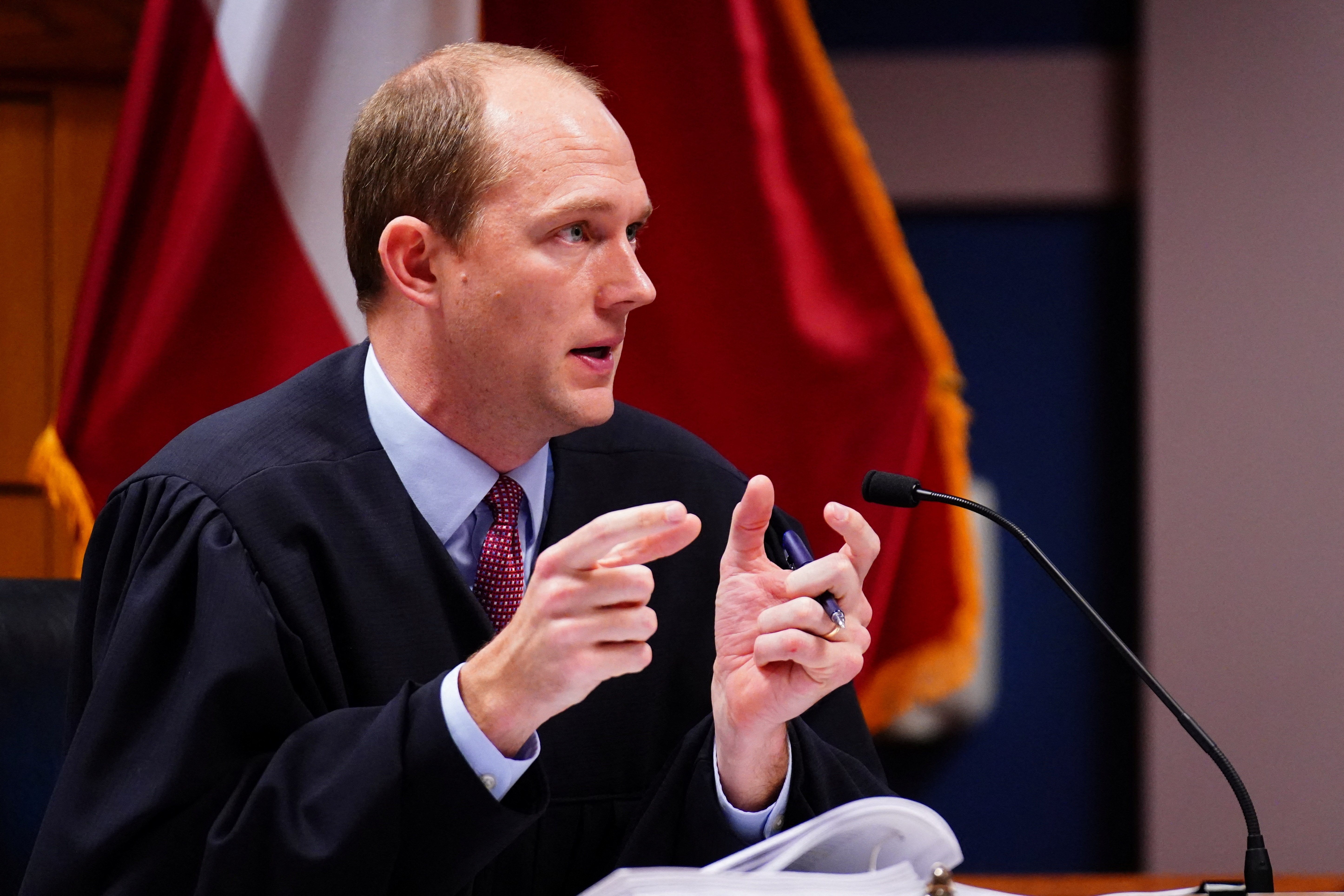 Judge Scott McAfee speaks as he attends a hearing in the Superior Court of Fulton County in Courtroom 5A in the case of State of Georgia v. Donald John Trump, in Atlanta, Georgia, U.S., December 1, 2023. 