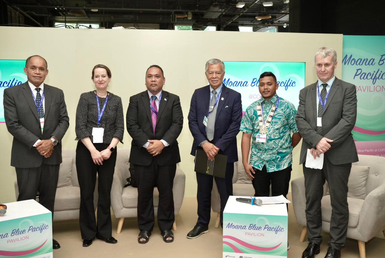 Pacific Islands Forum Secretary General Henry Puna, third right, at a Moana Blue Pacific Pavilion event last Saturday in Dubai at the COP28 climate summit.