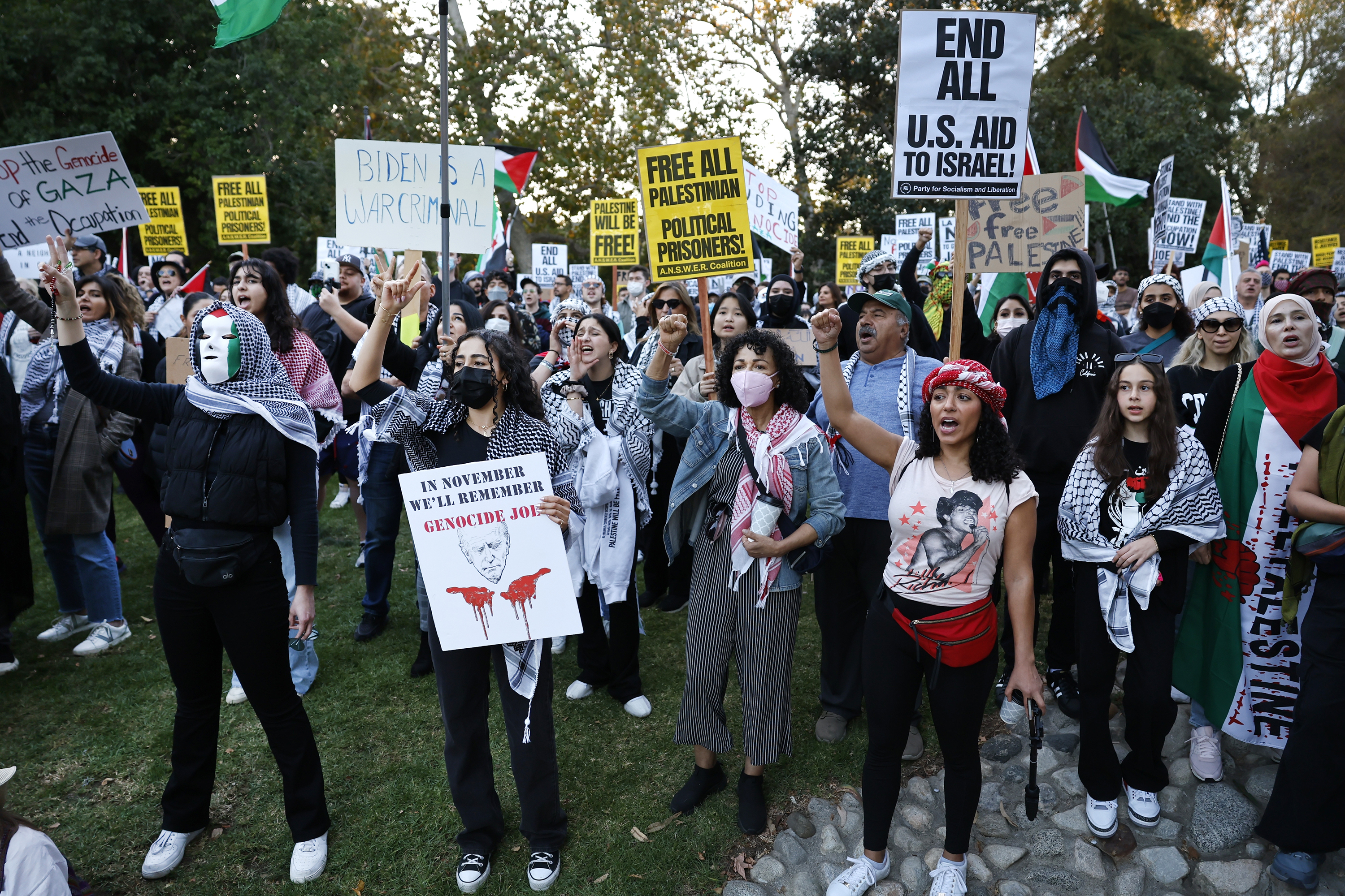 Members of the Palestinian Youth Movement calling for a cease-fire in Gaza rallied at Holmby Park in Los Angeles, where President Joe Biden was attending a fundraiser, on Dec. 8, 2023. (Gina Ferazzi/Los Angeles Times/TNS)