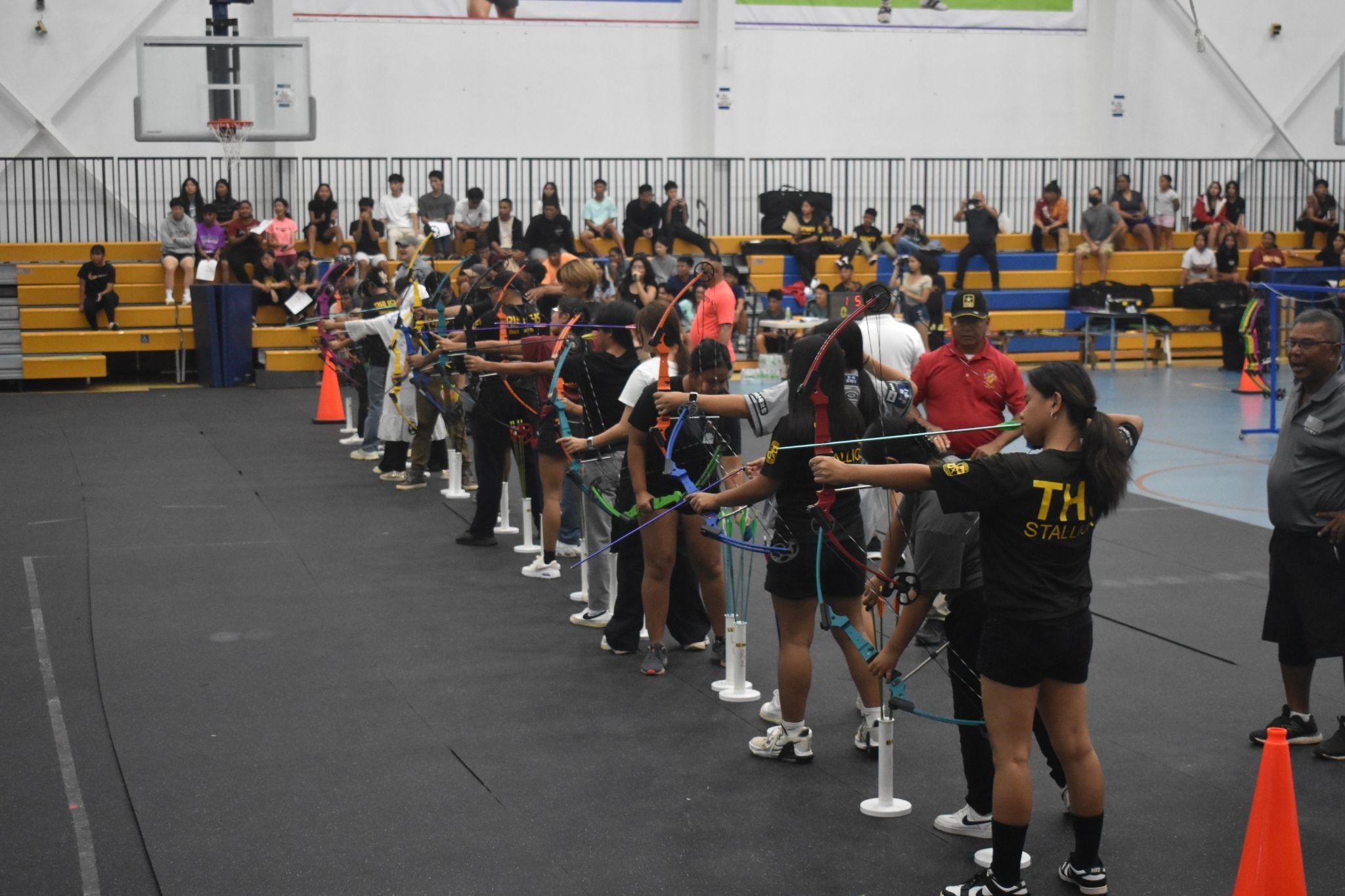 Second round of 10m with the three schools competing back-to-back.