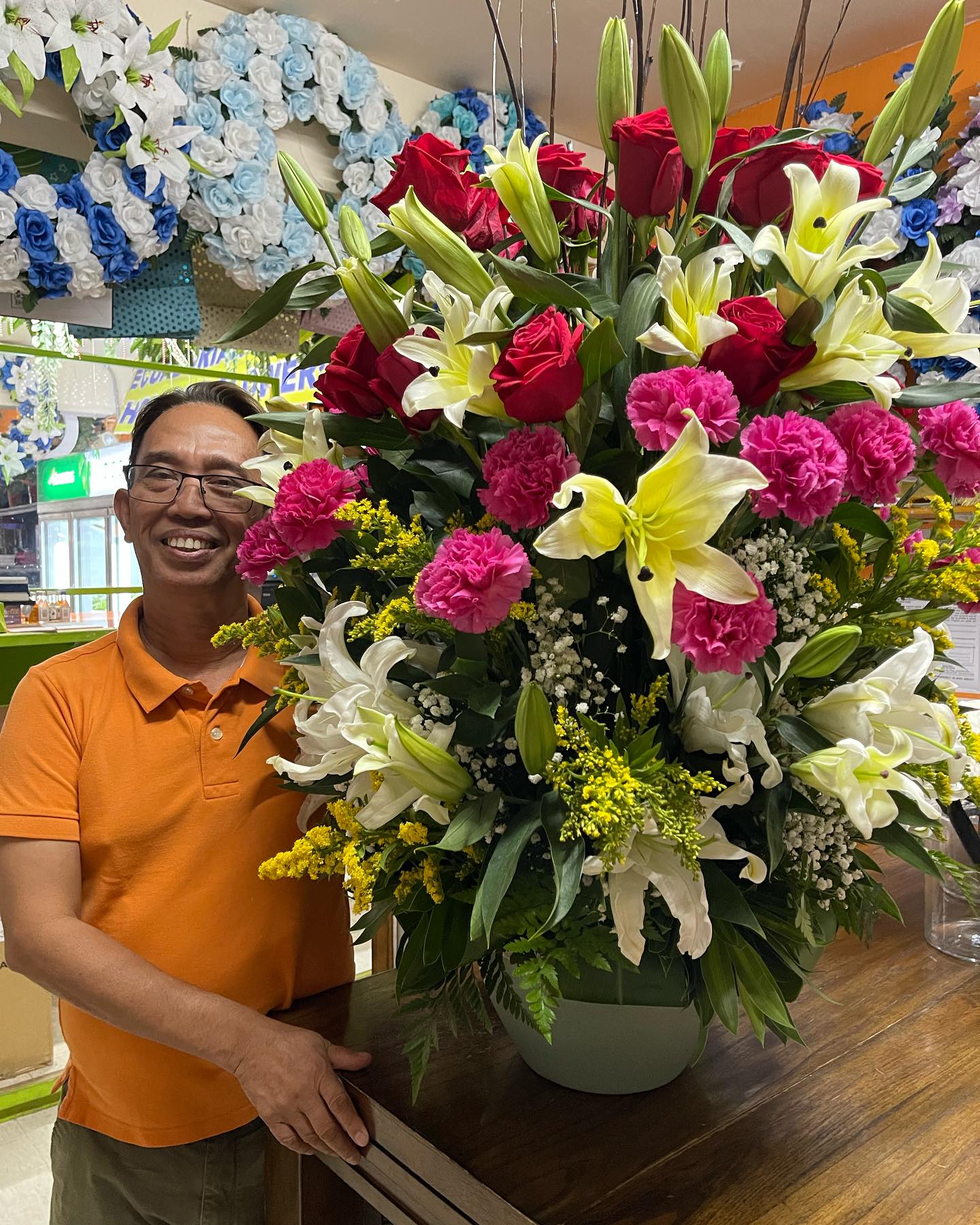 Philip Canuto poses with one of his creations.