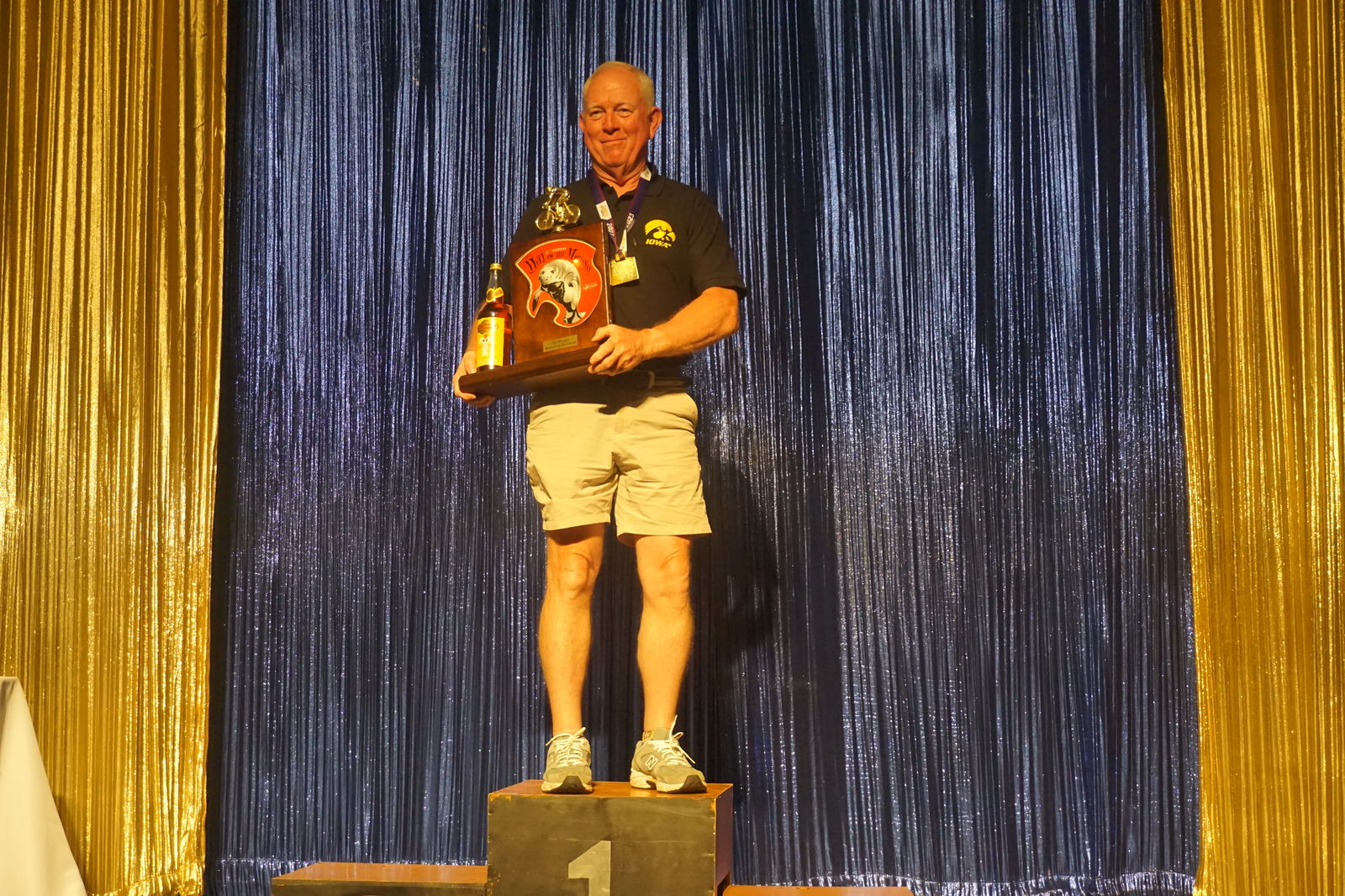 Stephen Nutting poses with the Manatee Division trophy during the awards ceremony of the 2023 Hell of the Marianas at the Hyatt Regency Saipan Ballroom on Saturday.