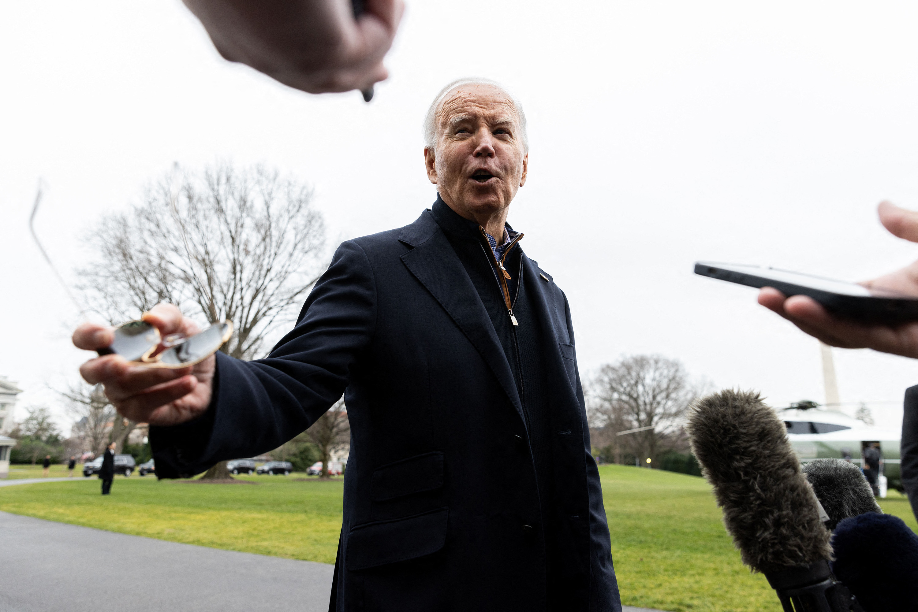 President Joe Biden speaks to reporters before departing the White House on Marine One in route to Camp David on Saturday, Dec. 23, 2023, in Washington, D.C. (Julia Nikhinson/Pool/Abaca Press/TNS)
