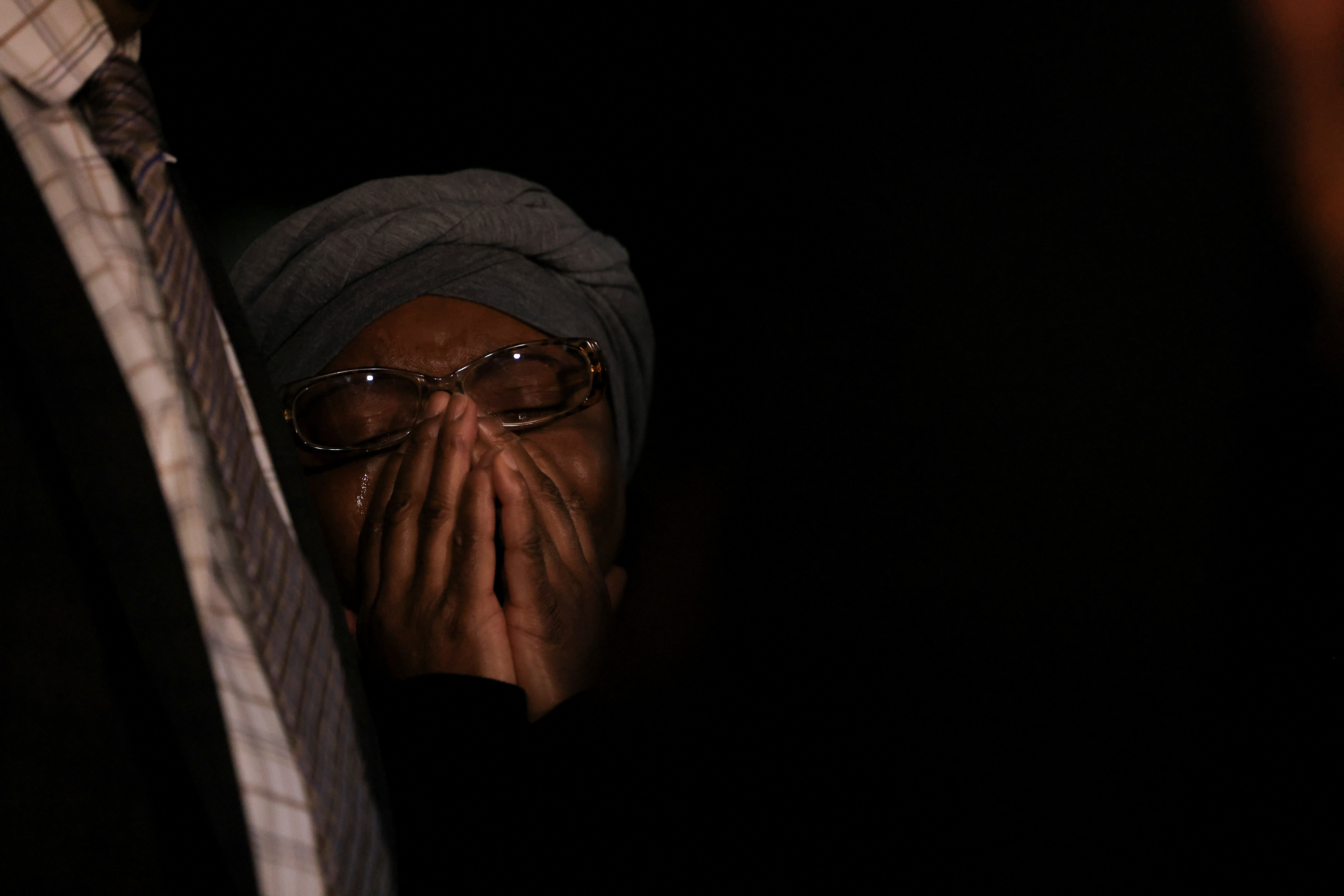 Sheneen McClain reacts after a jury delivered a guilty verdict of criminally negligent homicide for two paramedics who in 2019 injected her son Elijah McClain, an unarmed Black man, with ketamine after he was detained and subdued by police, outside the Adams County District Court in Brighton, Colorado, U.S., December 22, 2023. 