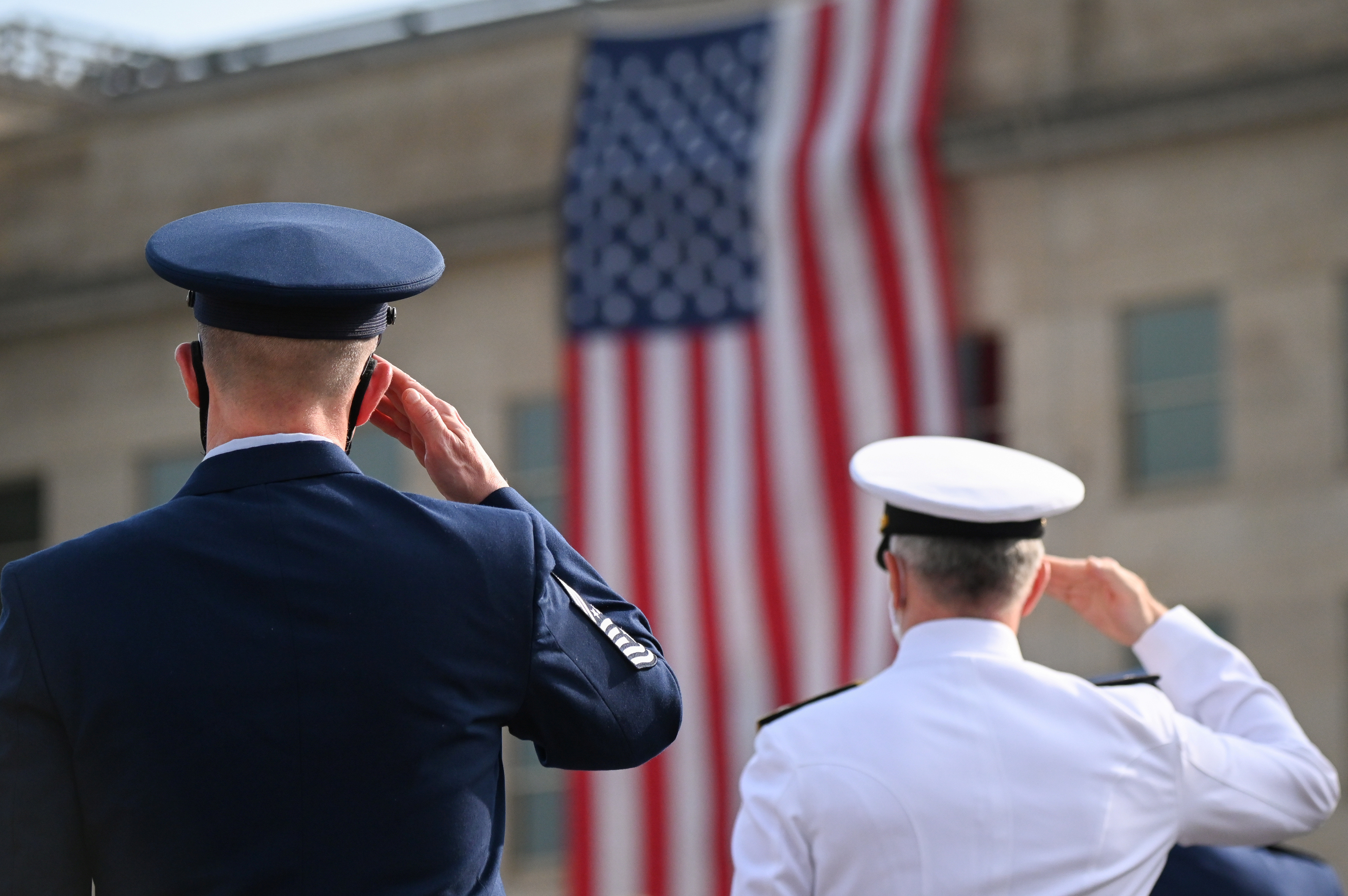 Members of the military salute during the 19th annual September 11 observance ceremony at the Pentagon in Arlington, Virginia, U.S., September 11, 2020. 