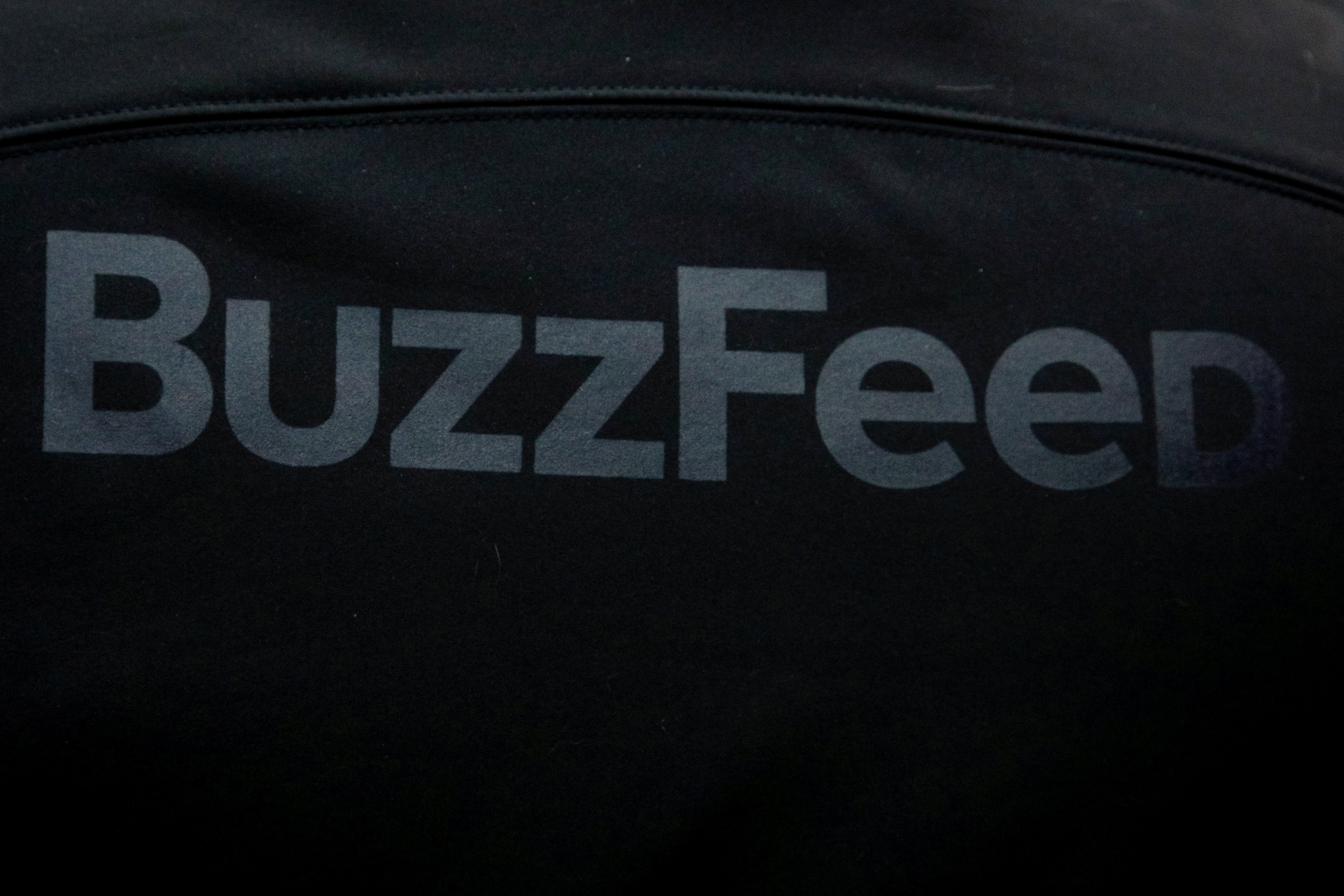 A BuzzFeed sign is seen during the company's debut outside the Nasdaq Market in Times Square in New York City, U.S., December 6, 2021. 
