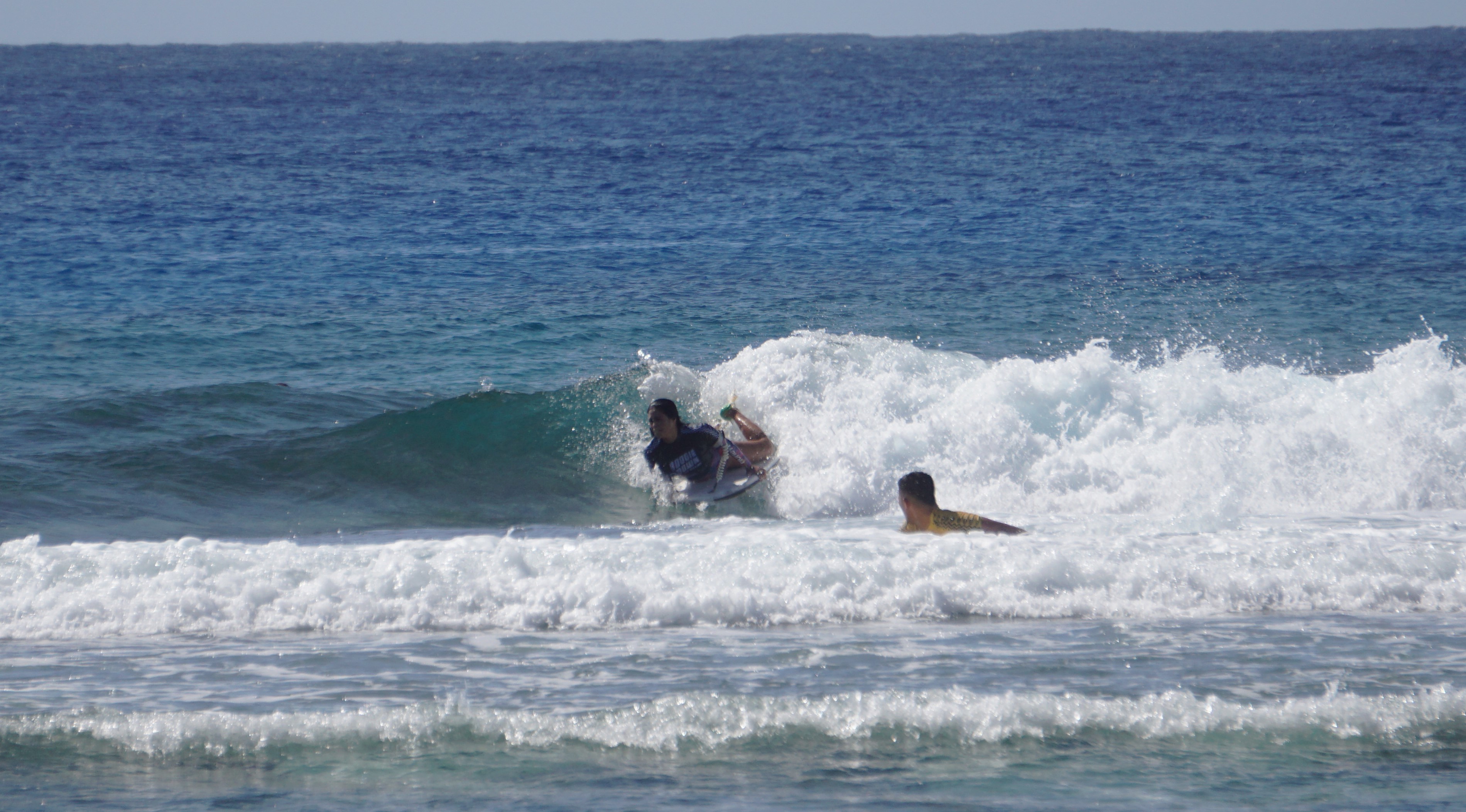 May Mendiola scores off a 360 spin as the wave ends. 