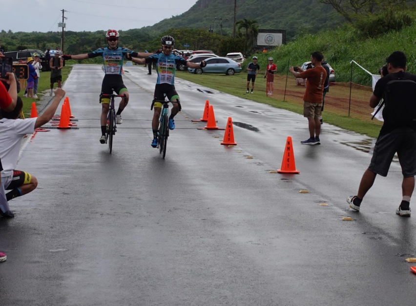 Ryohei Fujita, left, and Rinichiro Shigeta of Japan’s SunBrave Professional Cycling Team are the first to cross the finish line at 3:17:35 in this year’s Hell of the Marianas on Saipan.