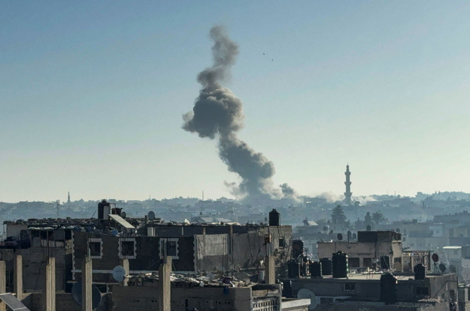 Smoke rises after an Israeli airstrike, amid the ongoing conflict between Israel and Palestinian Islamist group Hamas, in Khan Younis in the southern Gaza Strip, December 9, 2023. 