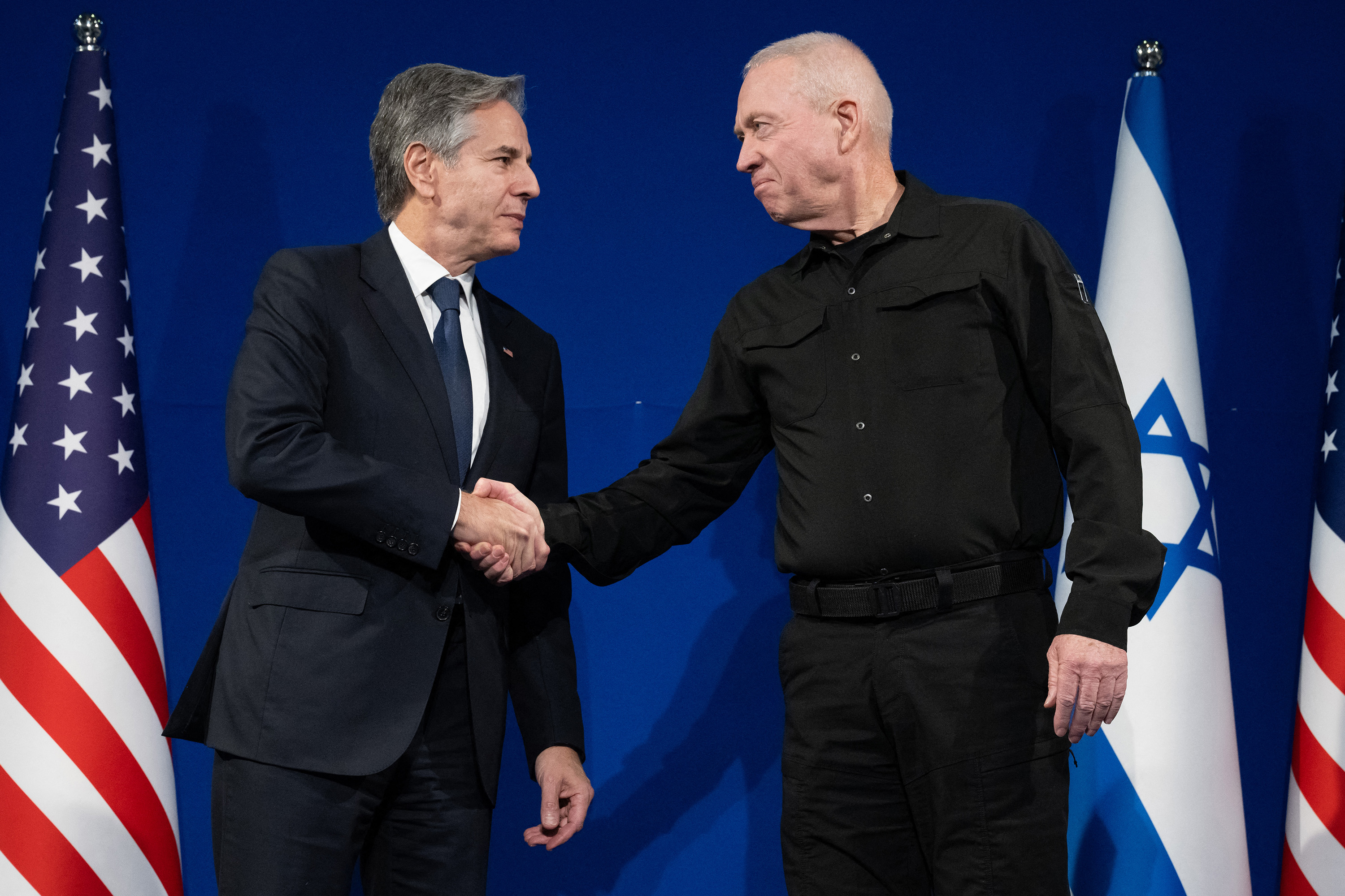 Israeli Defence Minister Yoav Gallant (right) and U.S. Secretary of State Antony Blinken shake hands prior to a meeting in Tel Aviv on Thursday, Nov. 30, 2023. (Saul Loeb/Pool/AFP/Getty Images/TNS)
