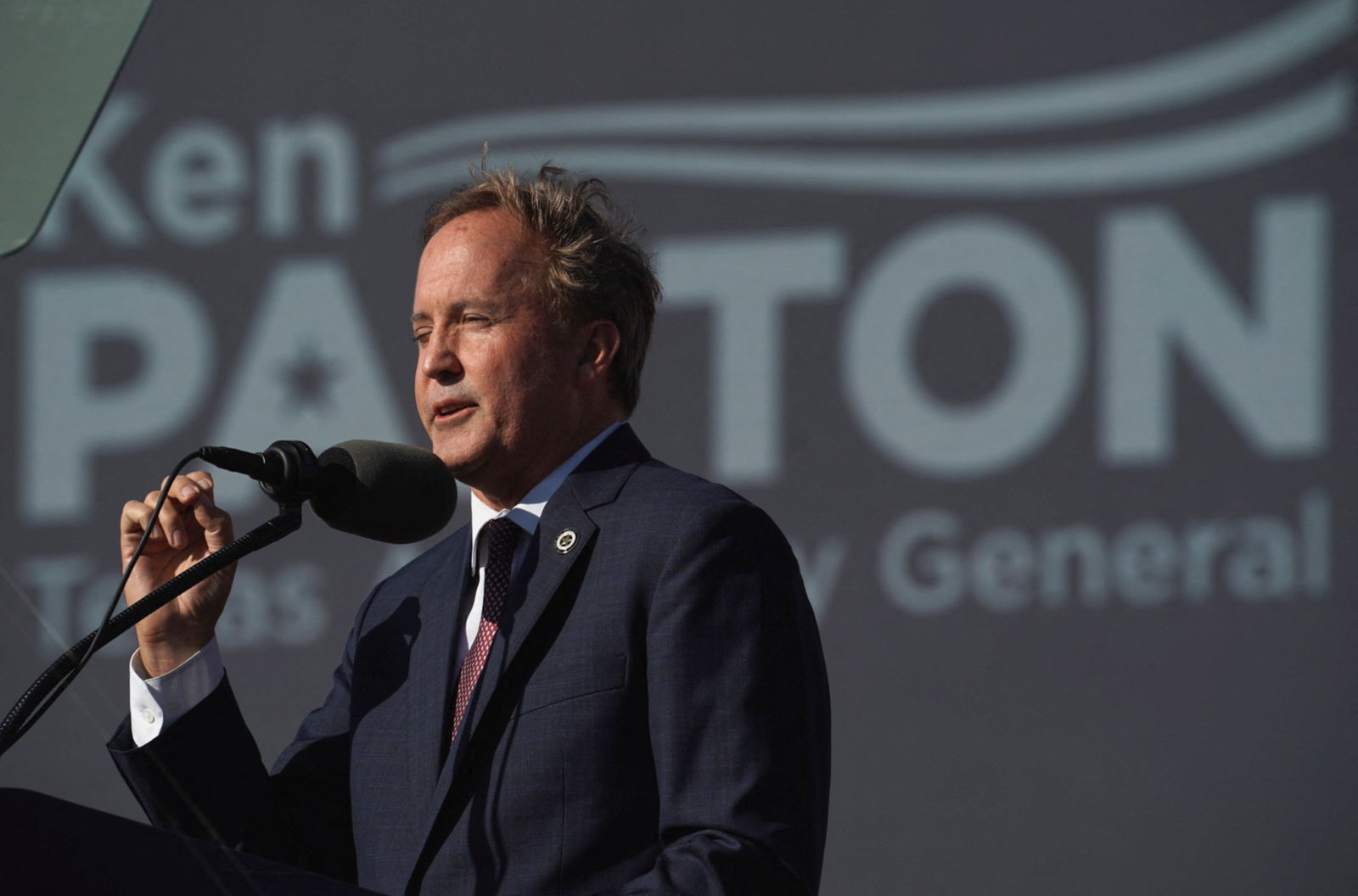 Texas Attorney General Ken Paxton speaks ahead of a rally held by former U.S. President Donald Trump, in Robstown, Texas, U.S., October 22, 2022. 