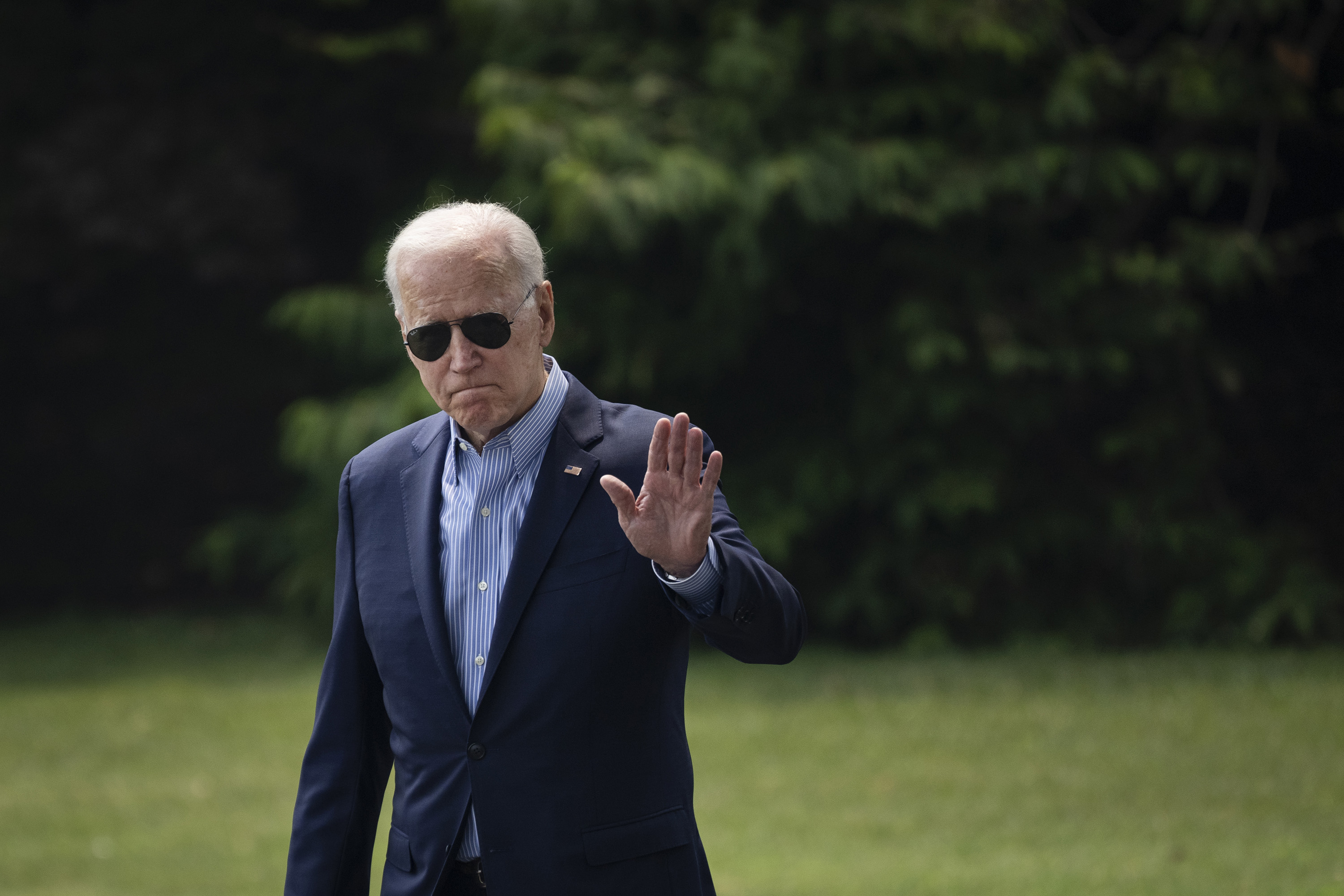U.S. President Joe Biden waves as he walks to Marine One on the South Lawn of the White House on July 21, 2021, in Washington, D.C. 