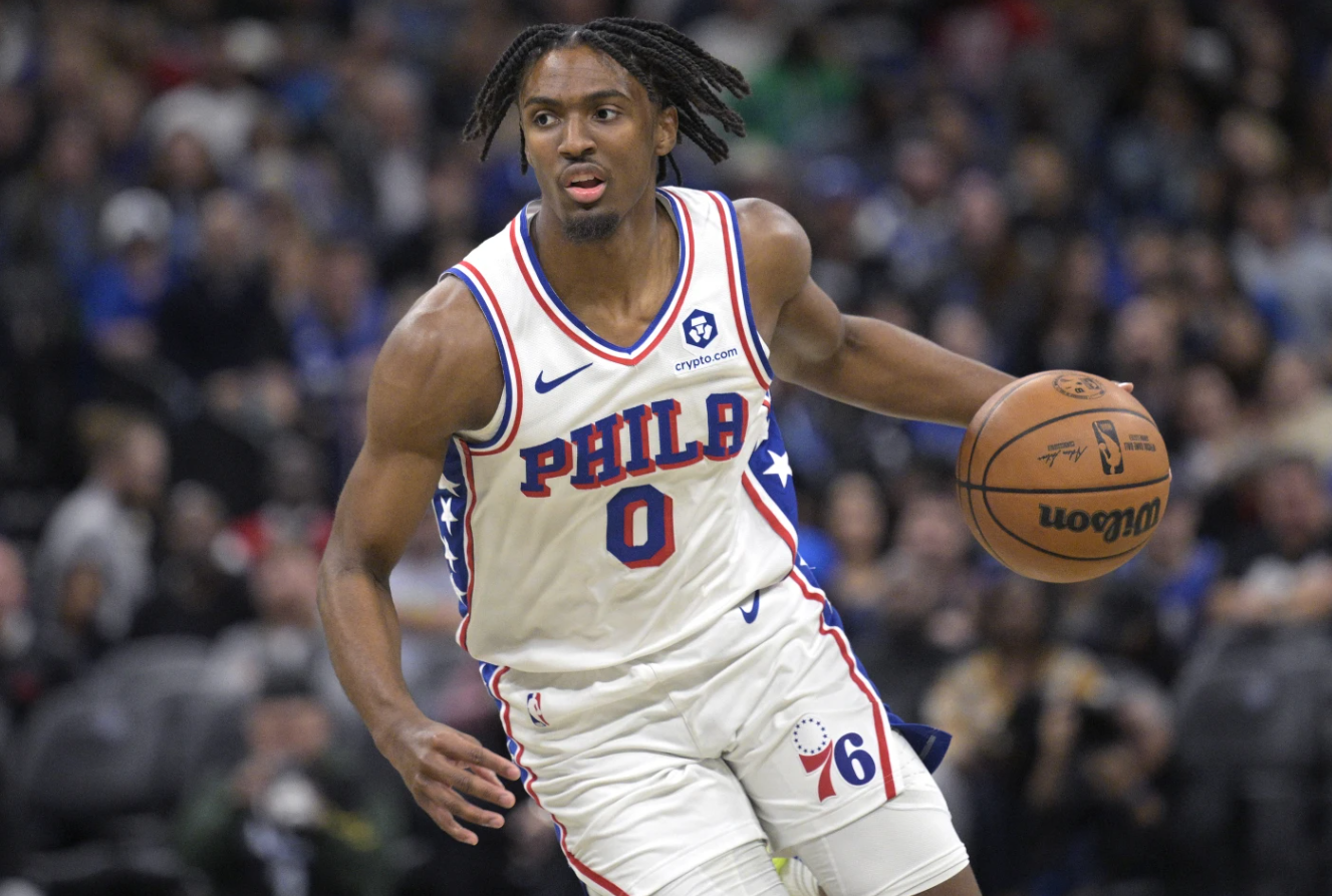 Philadelphia 76ers Tyrese Maxey drives to the basket during the first half of an NBA game against the Orlando Magic, Wednesday, Dec. 27, 2023 in Orlando, Fla.