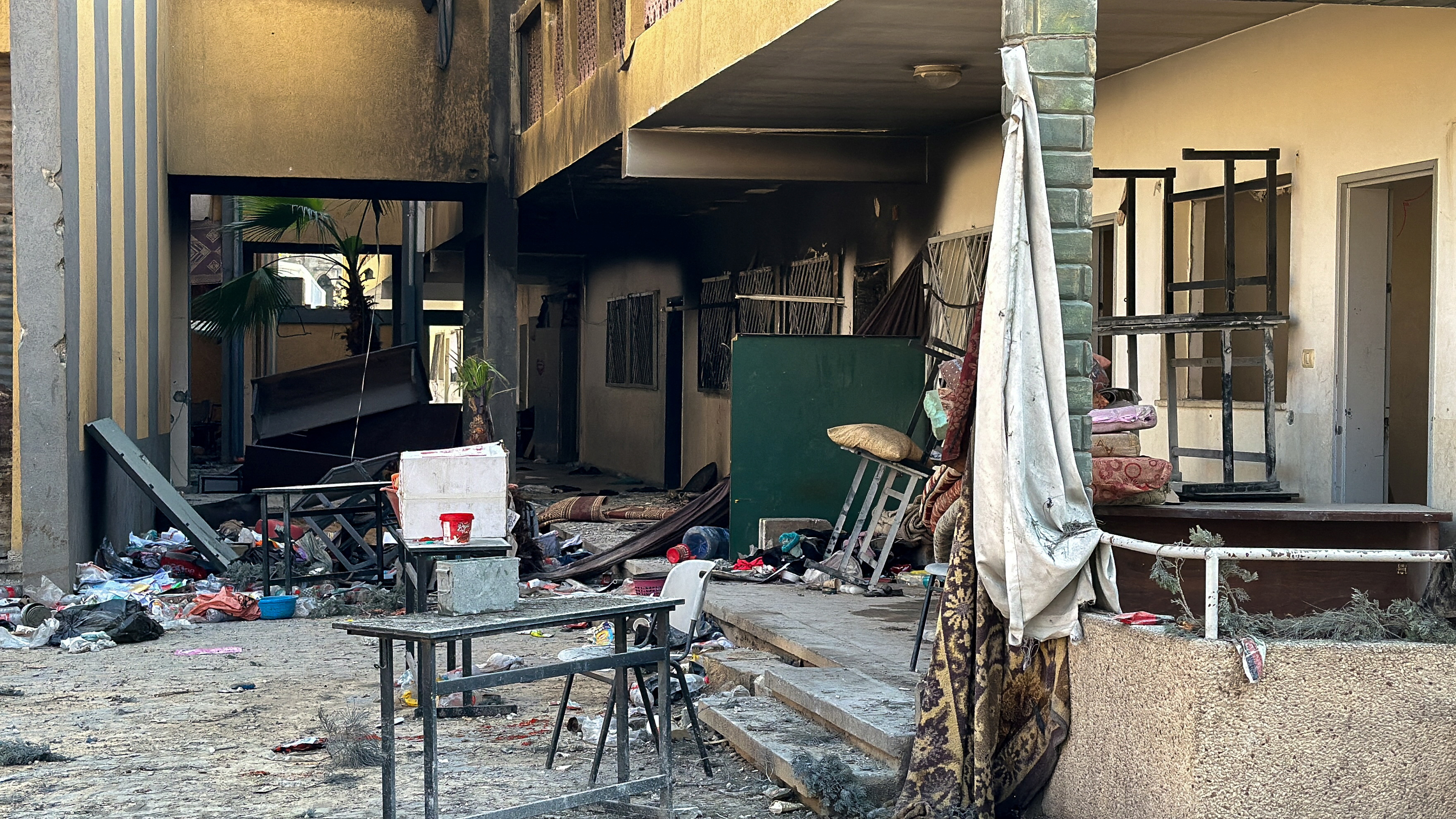 Debris covers the ground at damaged Shadia Abu Ghazaleh school following an Israeli raid, amid the ongoing conflict between Israel and Palestinian Islamist group Hamas, in Jabalia in the northern Gaza Strip, December 15, 2023. 