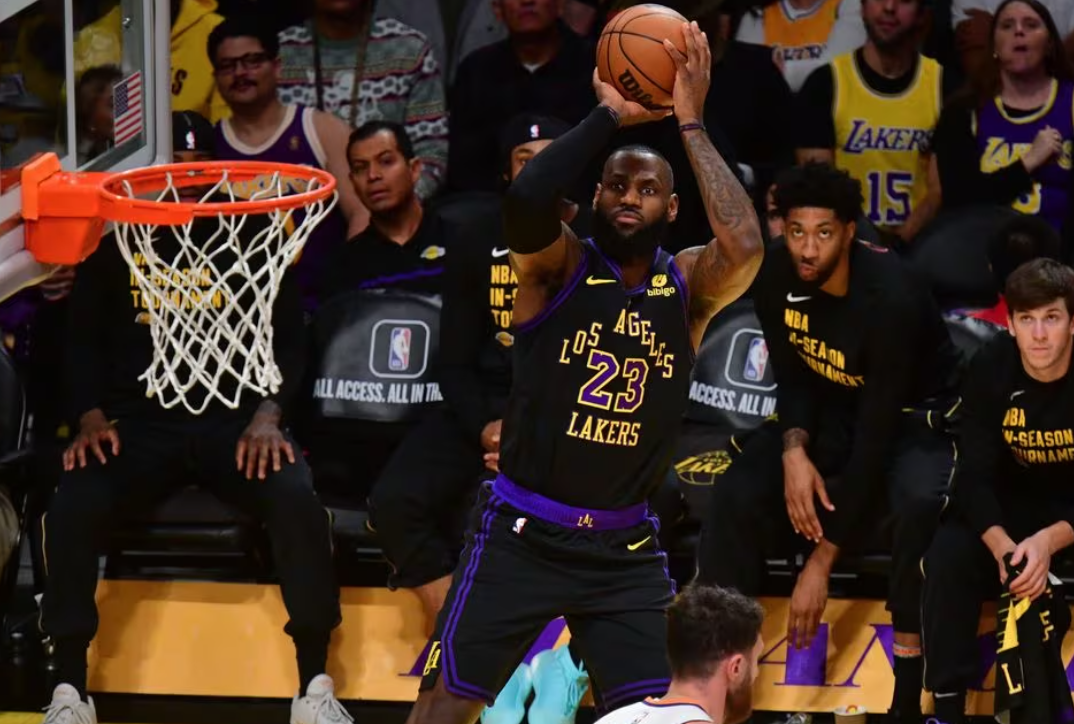 Los Angeles Lakers forward LeBron James (23) shoots against the Phoenix Suns during the first half of the In Season Tournament quarterfinal at Crypto.com Arena in Los Angeles, California, Dec 5, 2023.