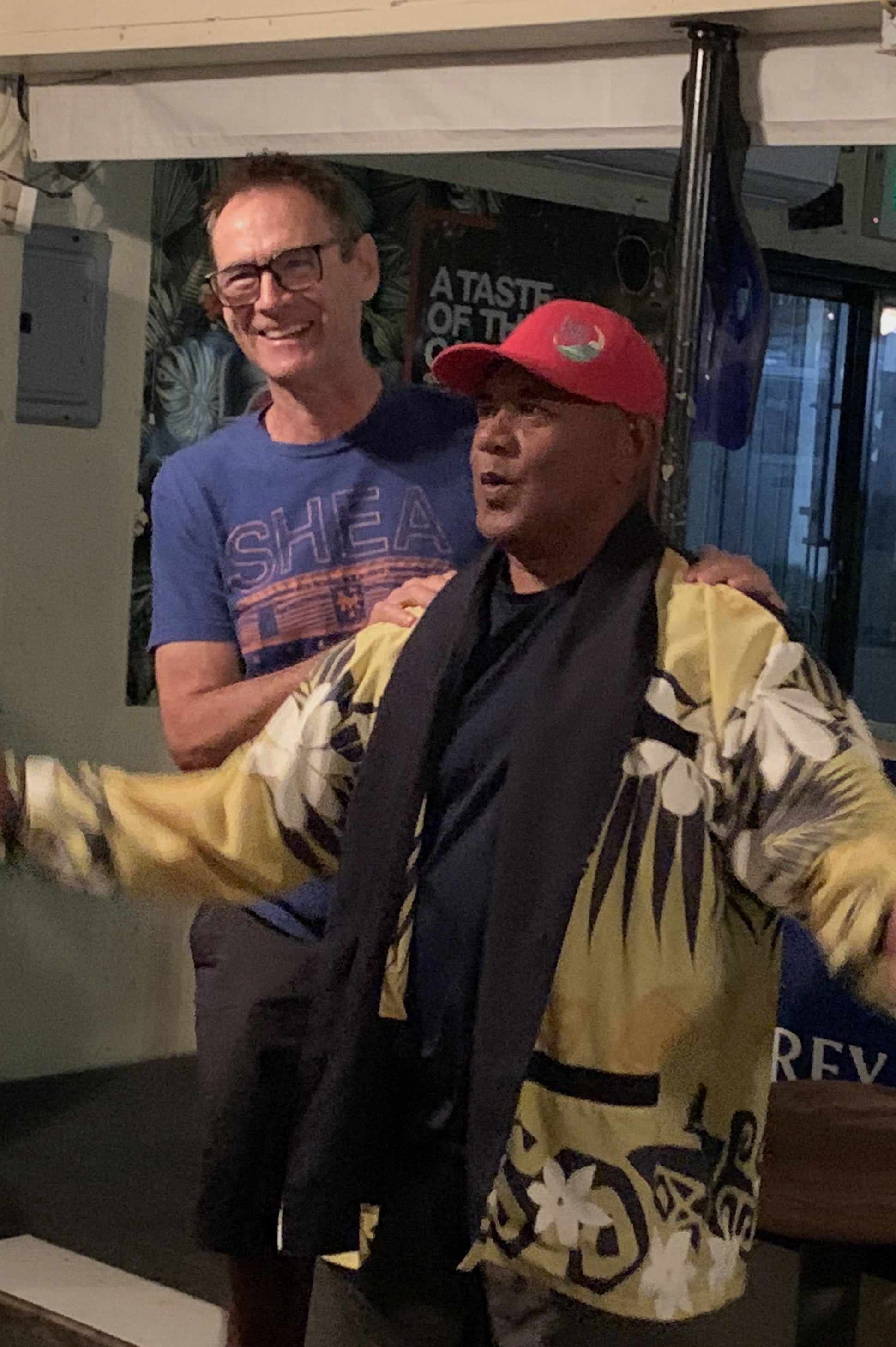 2022 Champion Fossil slips the champions jacket onto Maui-san’s broad shoulders.