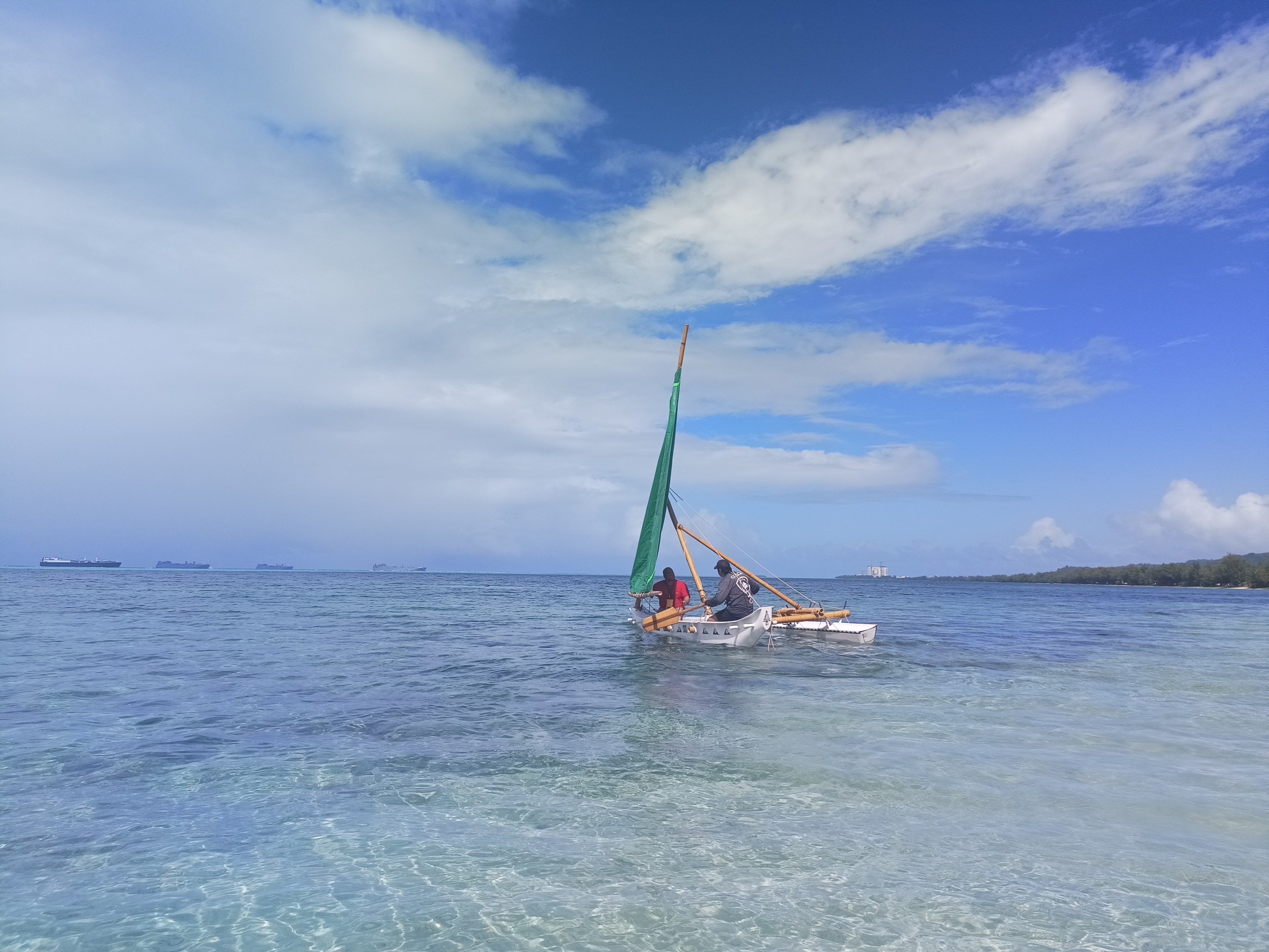 Den Yo Povi, guided by its owner Jeremiah Benevente, sails in the lagoon on the morning of its official launch.