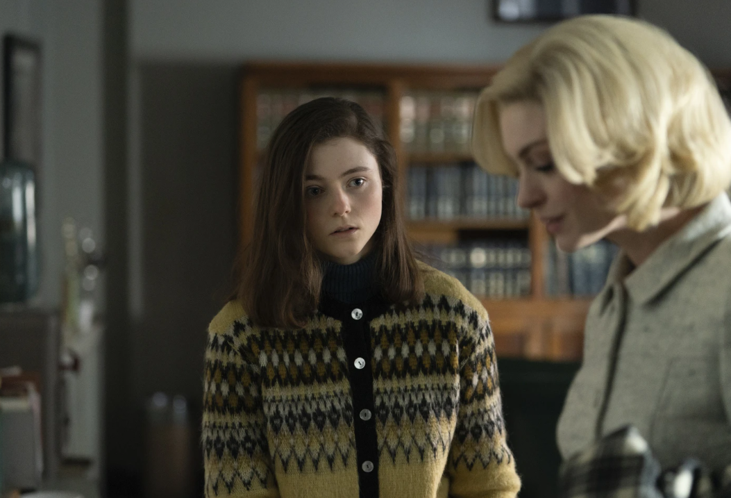 Thomasin McKenzie, left, and Anne Hathaway in a scene from “Eileen.”