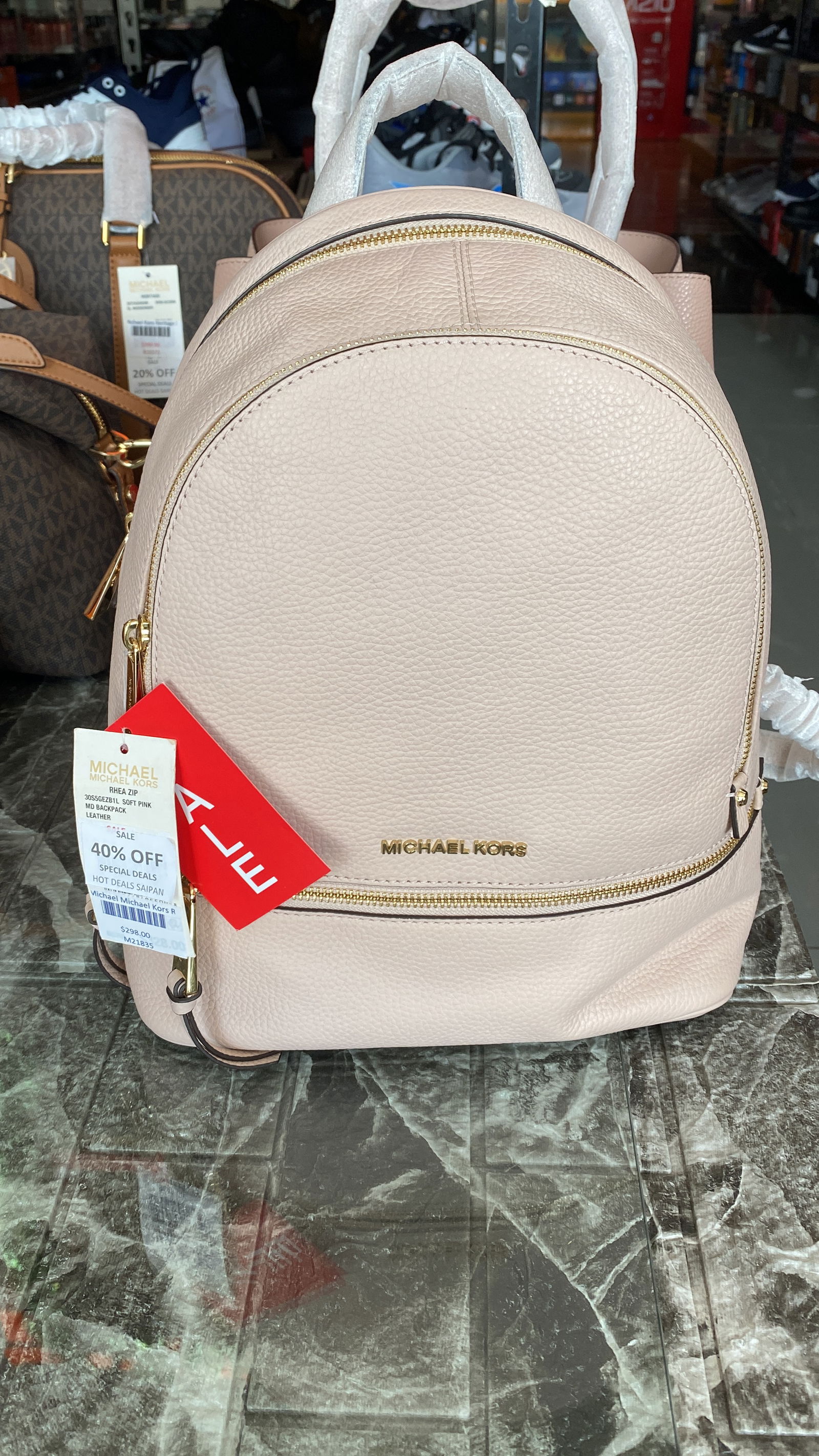 We all have that one bougie aunty who loves Micheal Kors. Get her this backpack, on promo at Hot Deals Saipan.