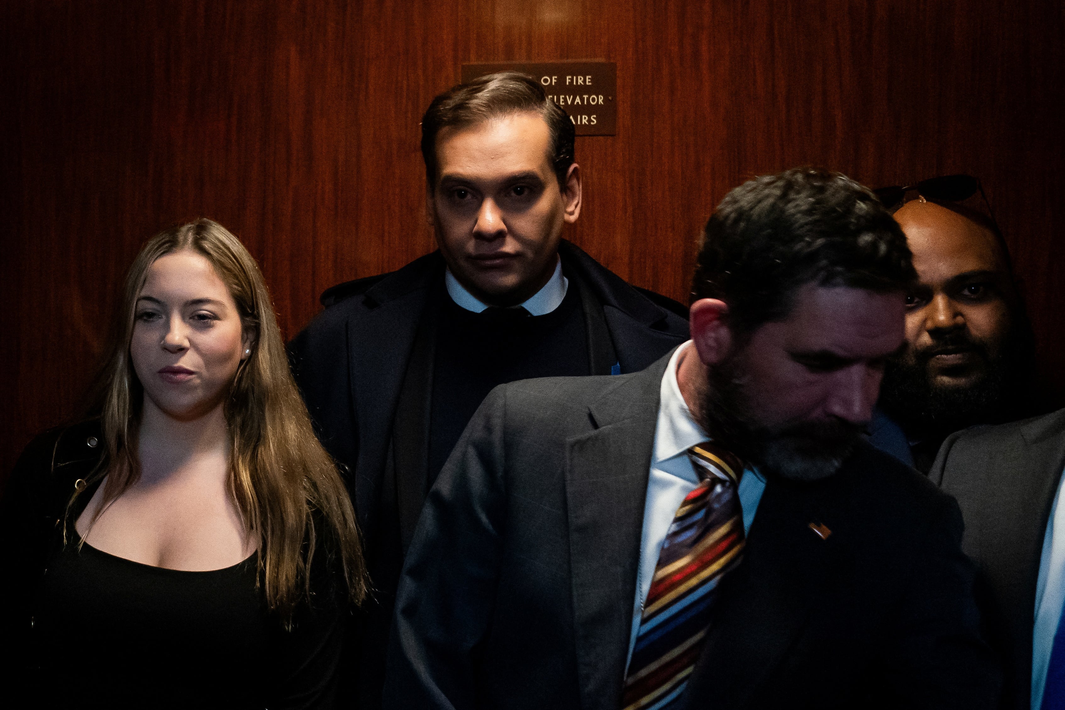 U.S. Representative George Santos (R-NY) stands in an elevator, to attend a series of votes including a vote to expel him from the House of Representatives, on Capitol Hill in Washington, U.S., December 1, 2023. 
