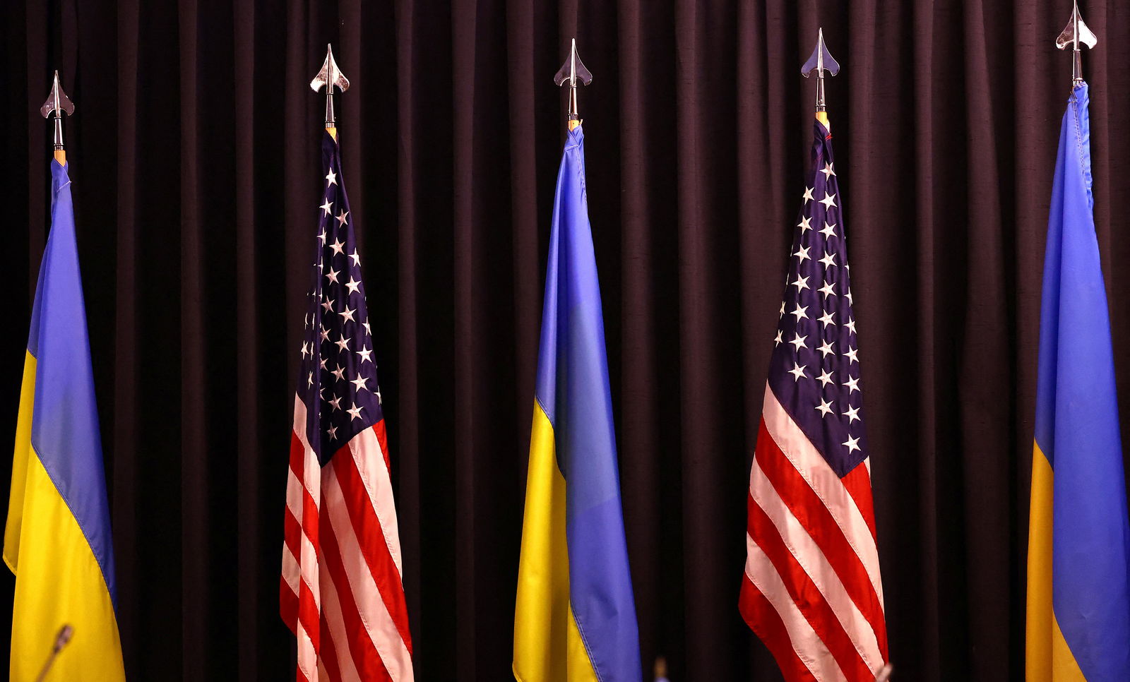 Ukraine and American flags are seen inside the conference room before U.S. Defense Secretary Lloyd James Austin opens the Ukraine Contact Group meeting at Ramstein airbase in Germany, September 19, 2023. 