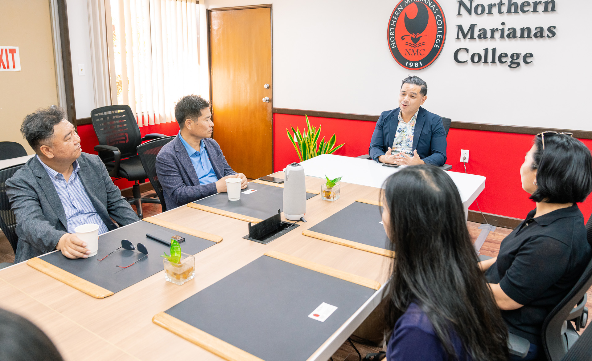 Northern Marianas College Vice President for Administration and Advancement Frankie Eliptico speaks with Daegu University President Dr. Soon Jin Park and Daegu University Dean of Students Won Gu Jang.