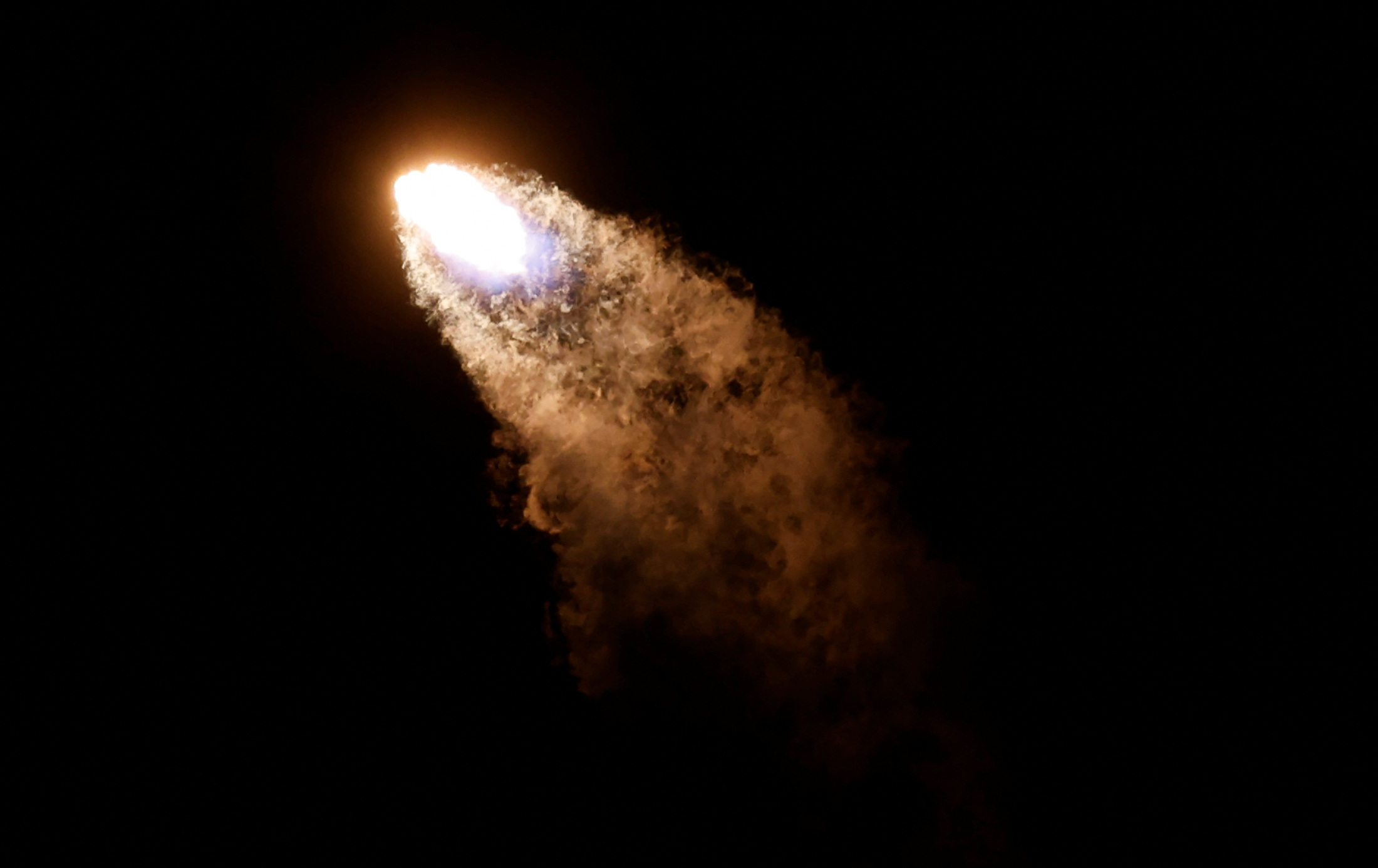 The U.S. military's secretive X-37B robot spaceplane lifts off on its seventh mission to orbit, the vehicle's first launch atop a SpaceX Falcon Heavy rocket capable of lofting it far higher than ever before from the Kennedy Space Center in Cape Canaveral, Florida, U.S., December 28, 2023.