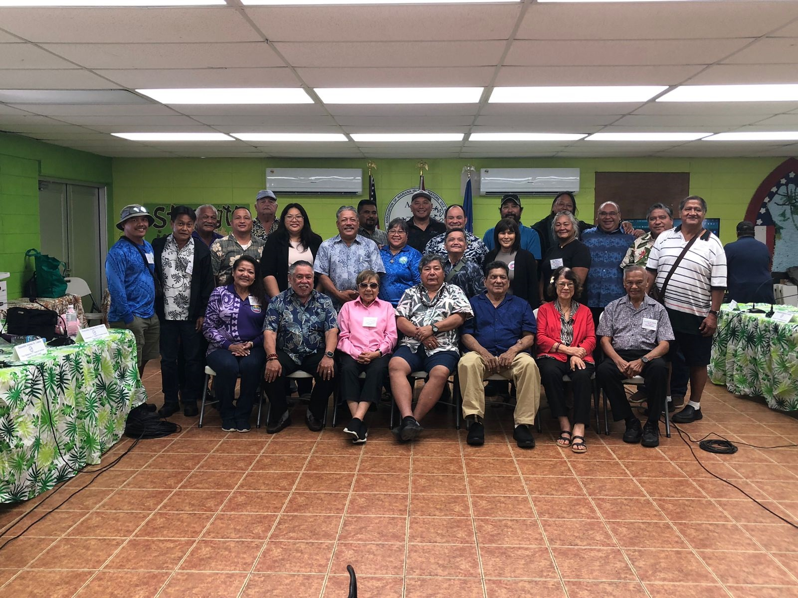 The Association of Mariana Islands Mayors, Vice Mayors and Municipal Council Members held its annual meeting in Agat, Guam on Nov. 29, 2023. Seated, front row: Tamuning Mayor Louise Rivera, AMIM Director Angel Sablan, Saipan Council Vice Chairwoman Tonie Tudela, Hagåtña Mayor John Cruz, Agana Heights Mayor Paul McDonald, Saipan Council Chairwoman Marian Tudela. Standing in background are Rota Municipal Council Chairman Jim Atalig, Rota Mayor Aubry Hocog, Tinian Mayor Edwin Aldan, Dededo Mayor Melissa Savares, Agat Mayor Kevin Susuico, Sinajana Mayor Robert Hofman, Tinian Municipal Council Chairman Steve Cabrera, Barrigada Mayor June Blas, Tinian Municipal Council Vice Chairwoman Ana San Nicolas, Humåtak Mayor Johnny Quinata and Malesso Mayor Ernest Chargualaf.