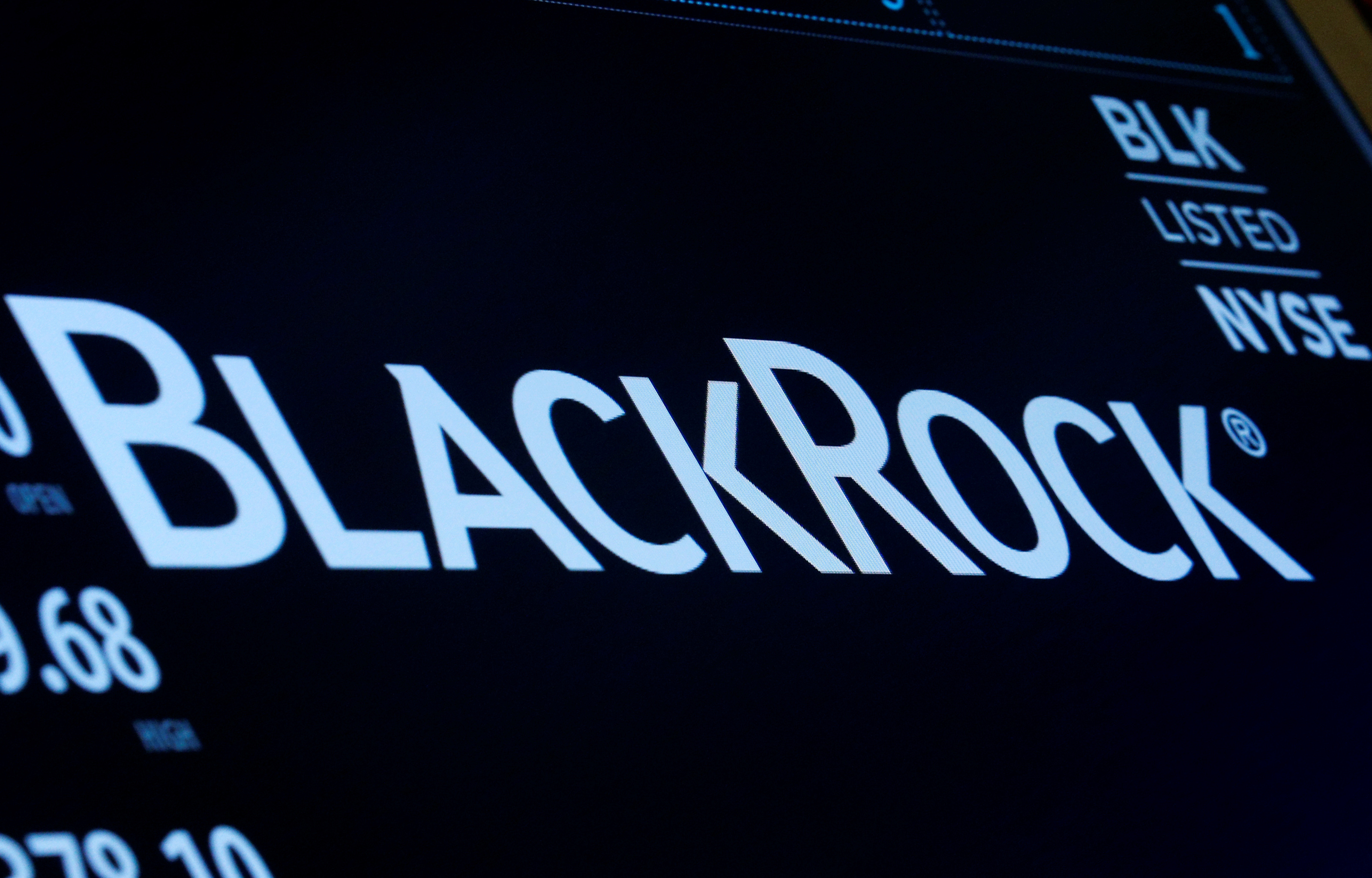 The company logo and trading information for BlackRock is displayed on a screen on the floor of the New York Stock Exchange (NYSE) in New York, U.S., March 30, 2017. 