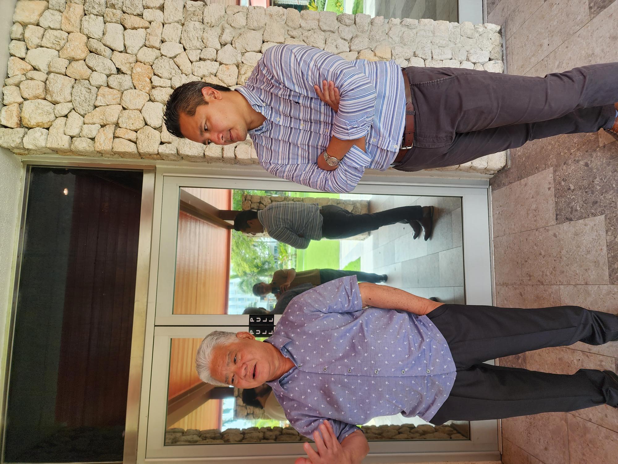 Gov. Arnold I. Palacios, left, talks to reporters as Marianas Visitors Authority Managing Director Christopher Concepcion listens during a break from MVA’s general membership meeting at Crowne Plaza Resort Saipan on Thursday.