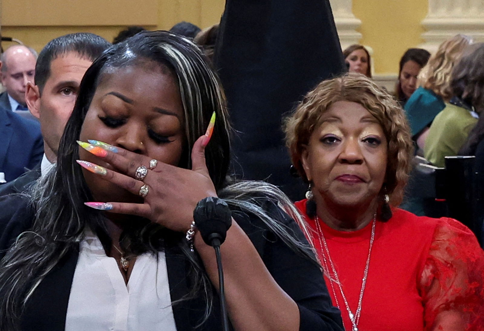 Wandrea "Shaye" Moss, former Elections Department employee in Fulton County, Georgia, testifies, as her mother, Georgia election worker Ruby Freeman looks on, during the fourth public hearing of the U.S. House Select Committee to investigate the January 6, 2021 attack on the U.S. Capitol, on Capitol Hill in Washington, DC, U.S. June 21, 2022. 