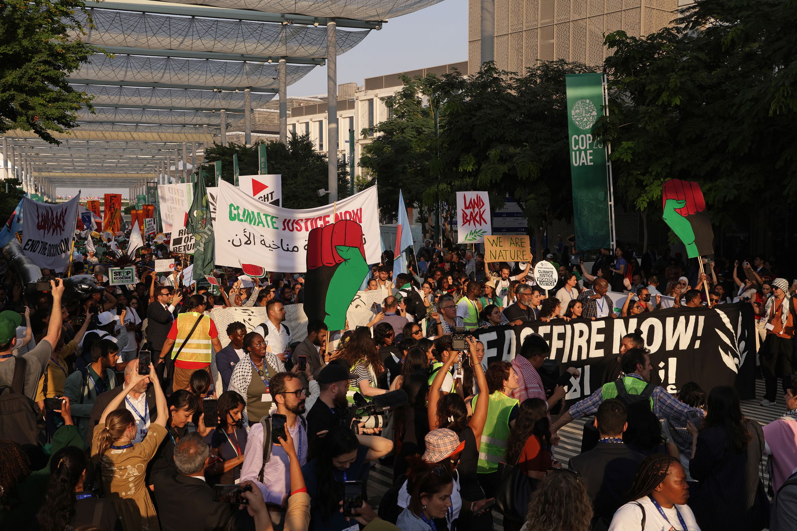 Activists march in protest during the UNFCCC COP28 Climate Conference at Expo City Dubai on Saturday, Dec. 9, 2023, in Dubai, United Arab Emirates. (Sean Gallup/Getty Images/TNS)