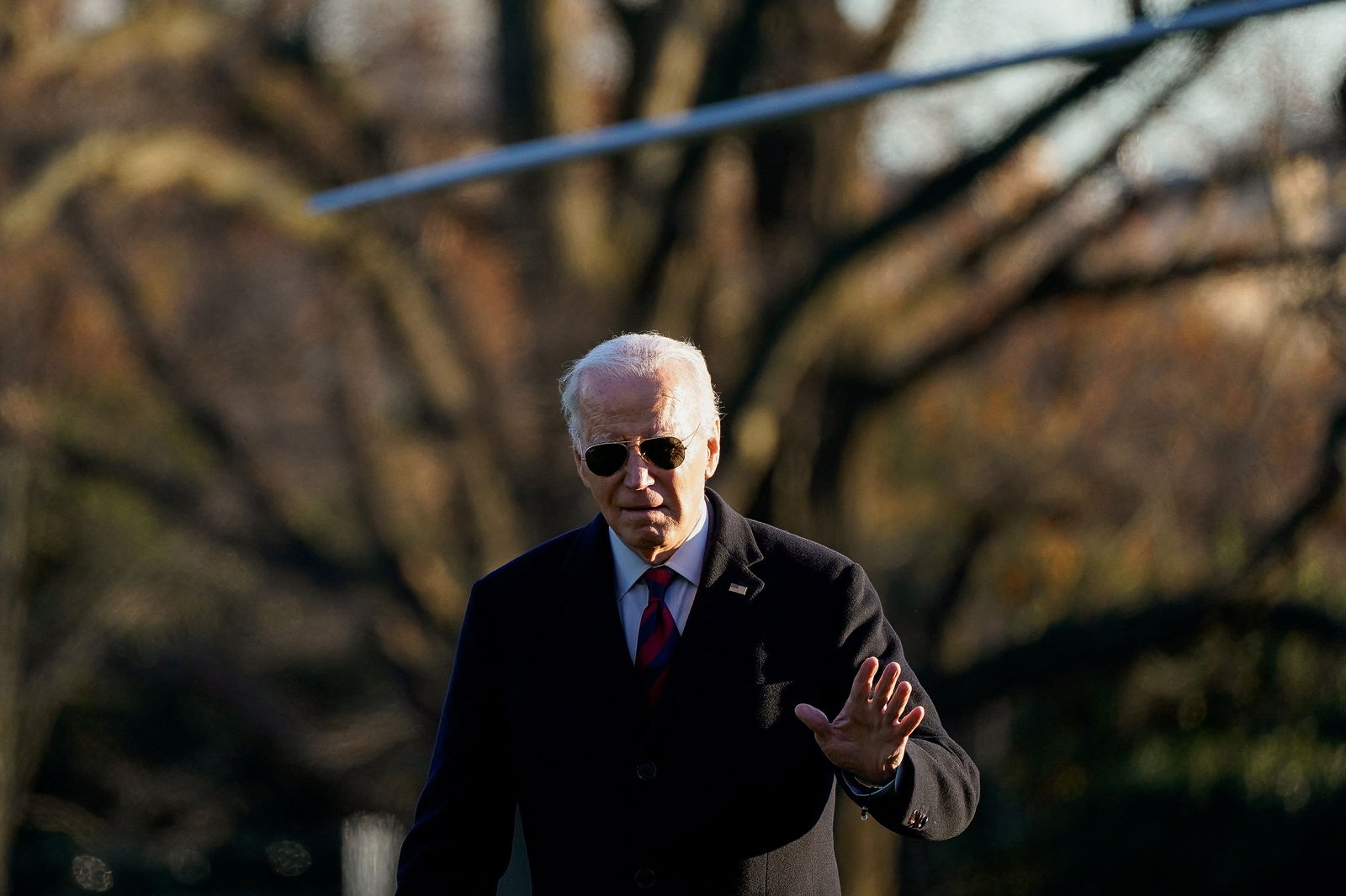 U.S. President Joe Biden walks from Marine One as he returns to the White House in Washington, U.S., December 11, 2023. 