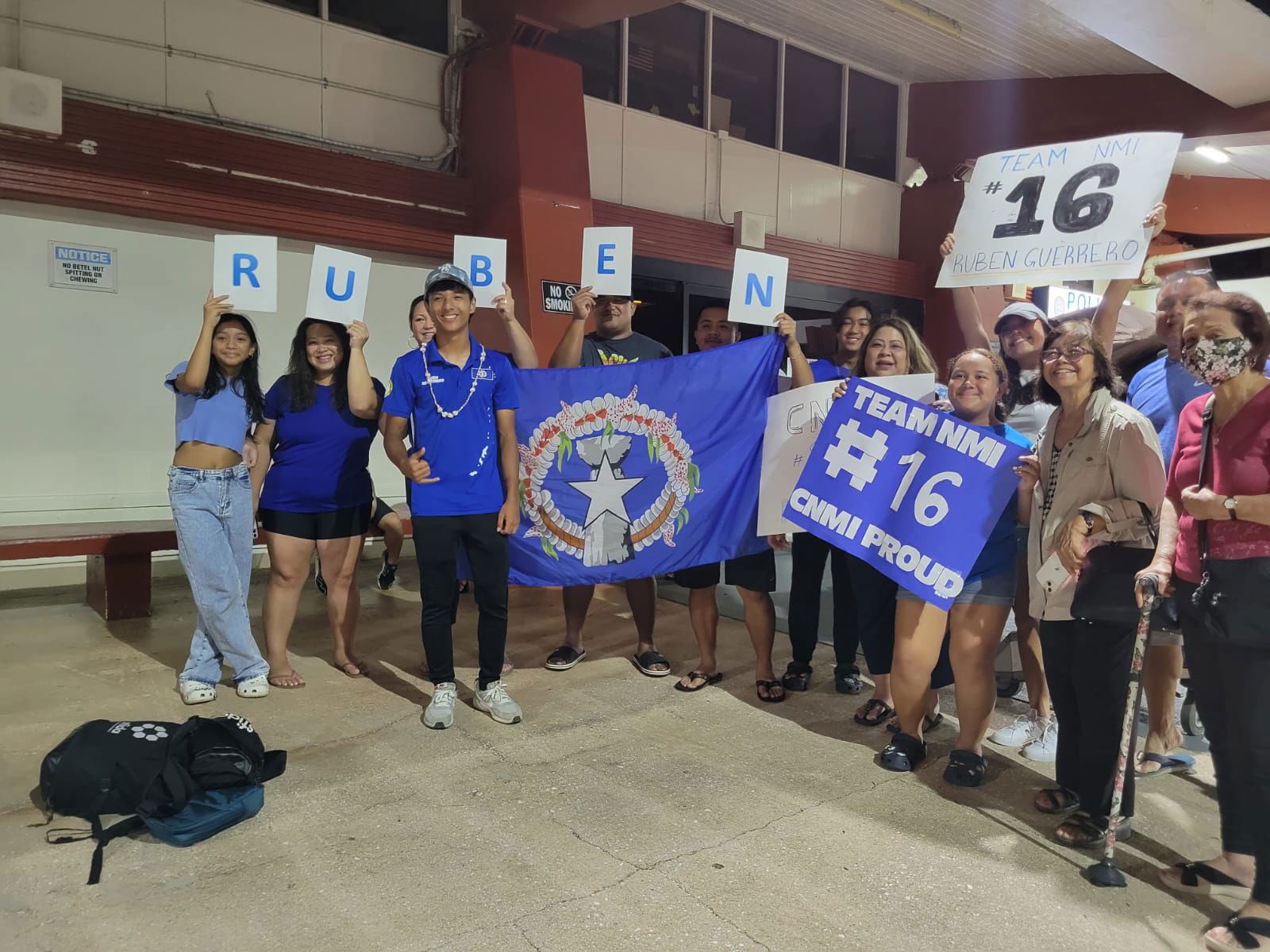 NMI Men’s National Football Team member Ruben Guerrero is welcomed by his family members at the Francisco C. Ada/Saipan International Airport on Sunday night.
