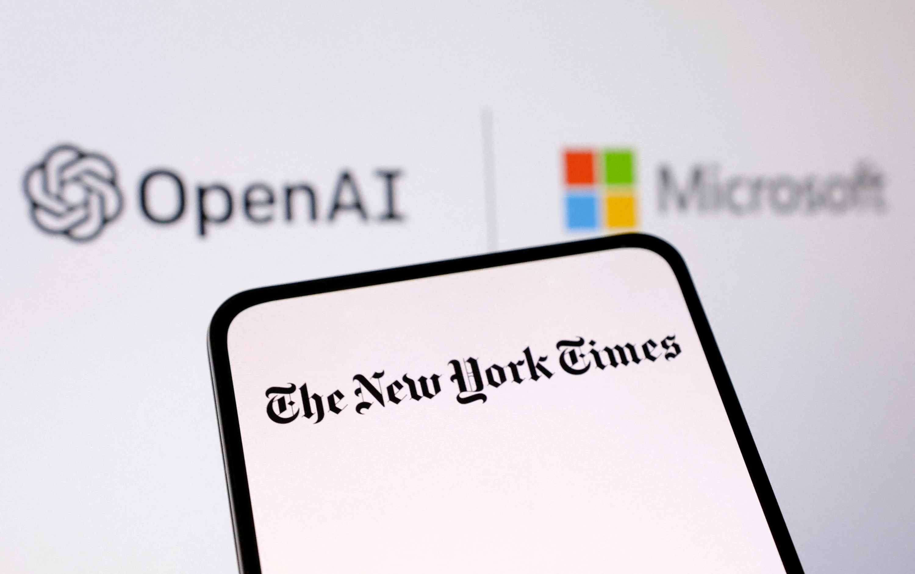 OpenAI, Microsoft and The New York Times logos are seen in this illustration taken December 27, 2023. REUTERS/Dado Ruvic/Illustration