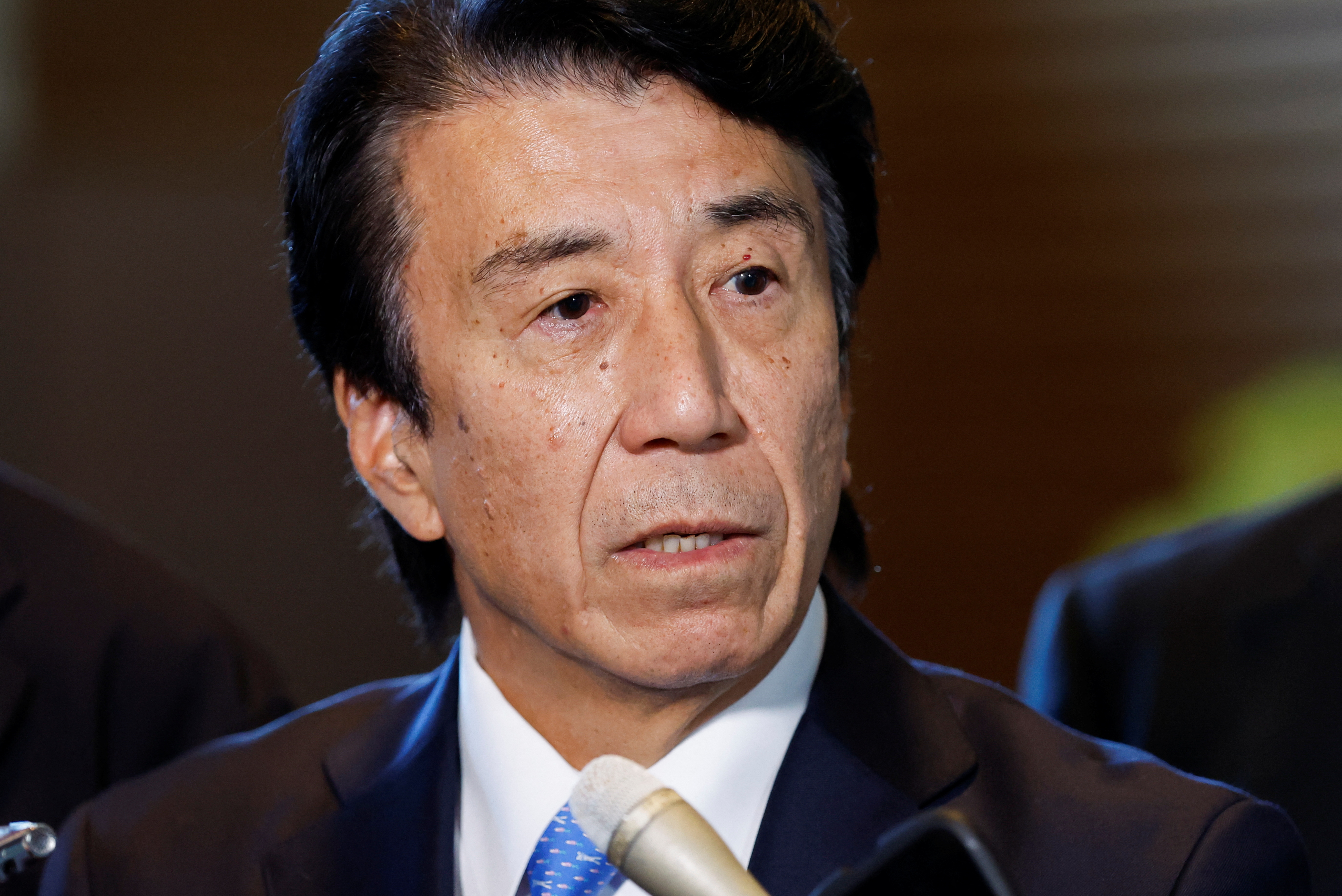 Japan's incoming Economy, Trade and Industry Minister Ken Saito speaks to media at Prime Minister Fumio Kishida's official residence in Tokyo, Japan December 14, 2023. 