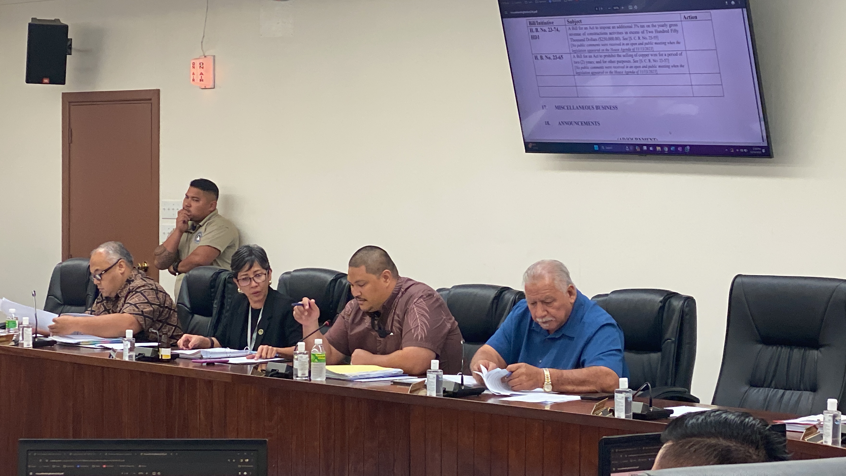 Rep. Diego Camacho, 2nd right,  speaks during a House session on Thursday.