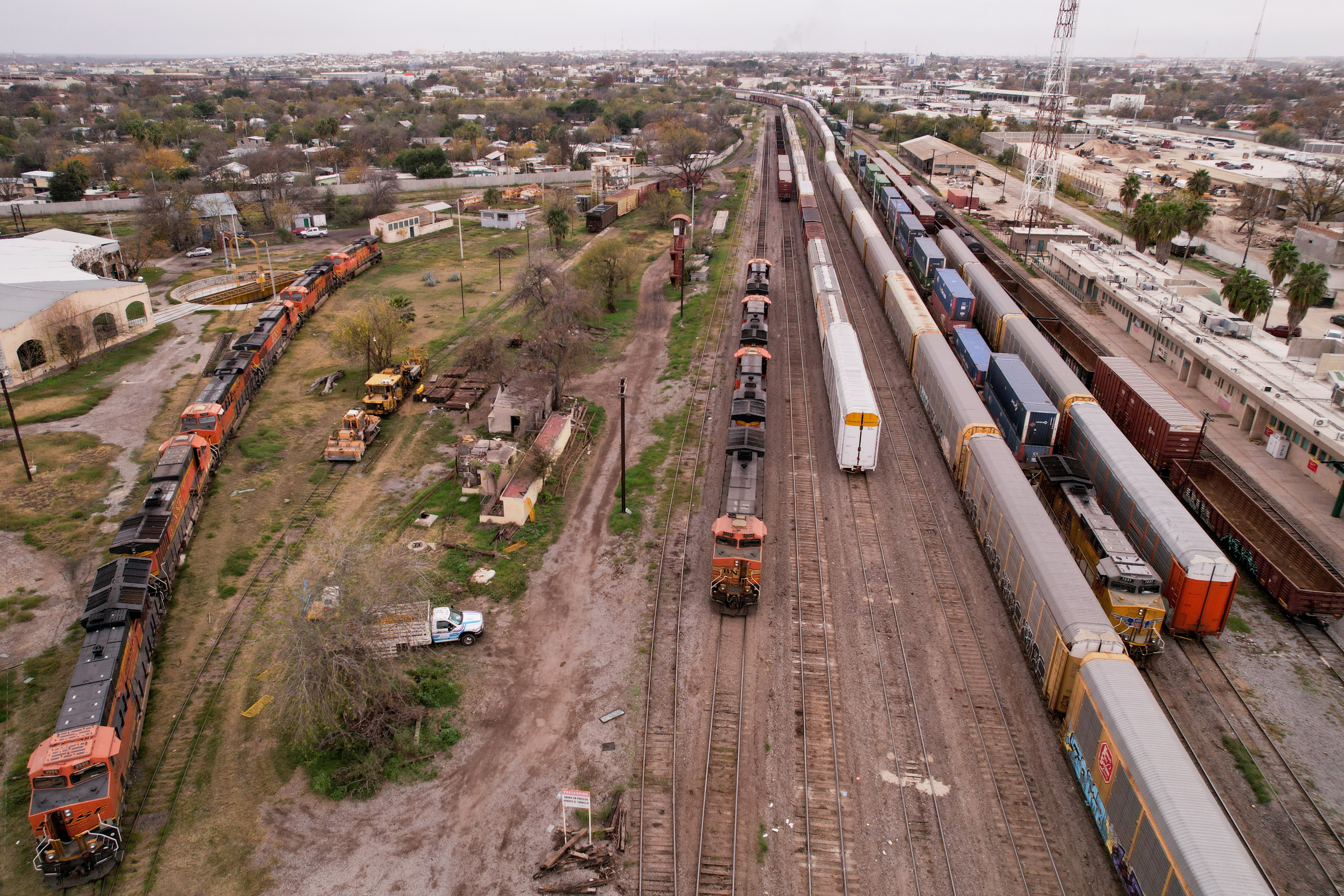 Stranded freight trains wait at a railroad yard, near the border between Mexico and the United States after a five-day suspension due to U.S. authorities closing railway bridges in Eagle Pass and El Paso, Texas, in order to redirect personnel to stop an increase in the migration, in Piedras Negras, Cohauila, Mexico December 22, 2023. 